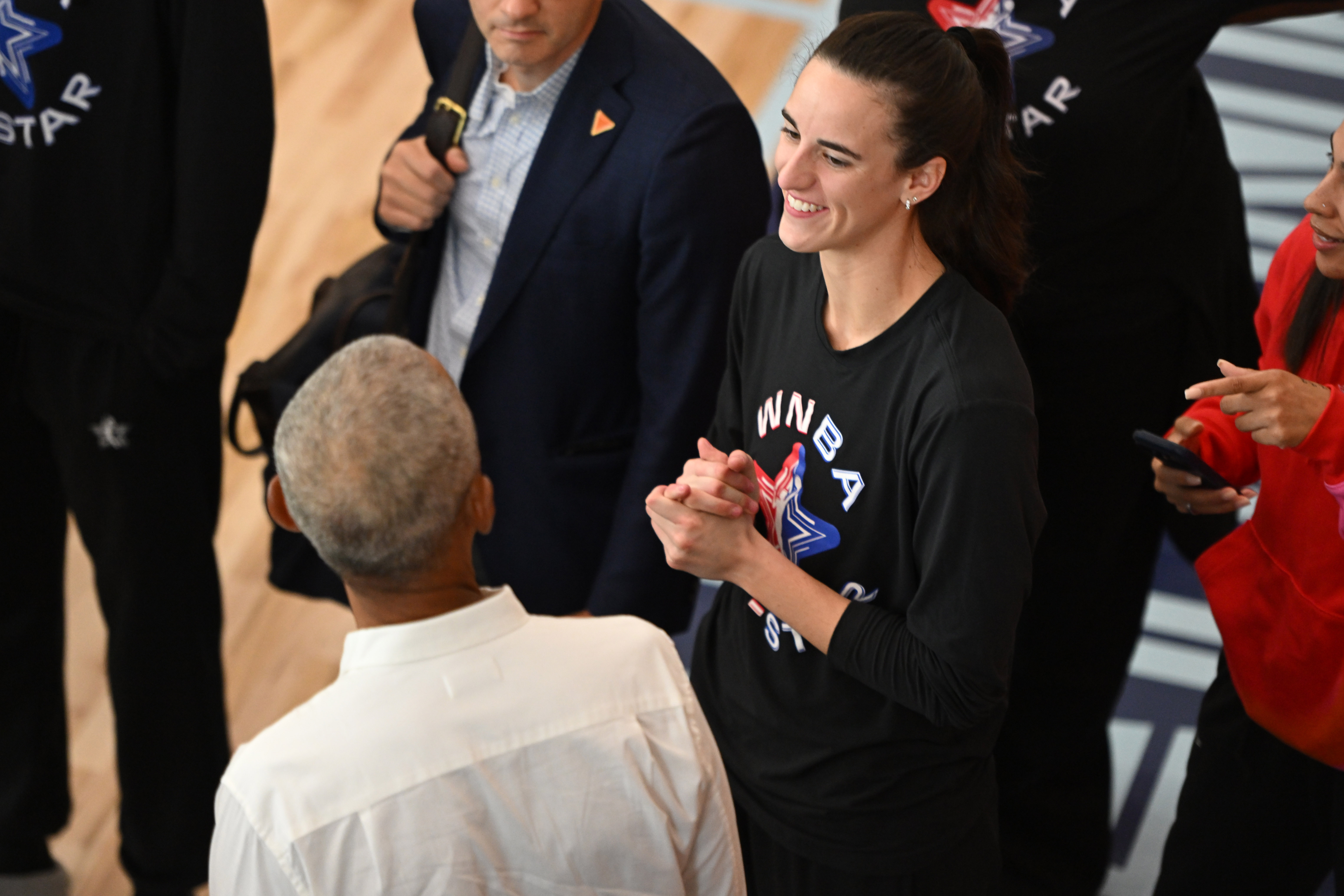 A day in the life of Caitlin Clark: All-Star business as usual, Barack Obama's presidential perspective and 'Studbudz' shoutouts