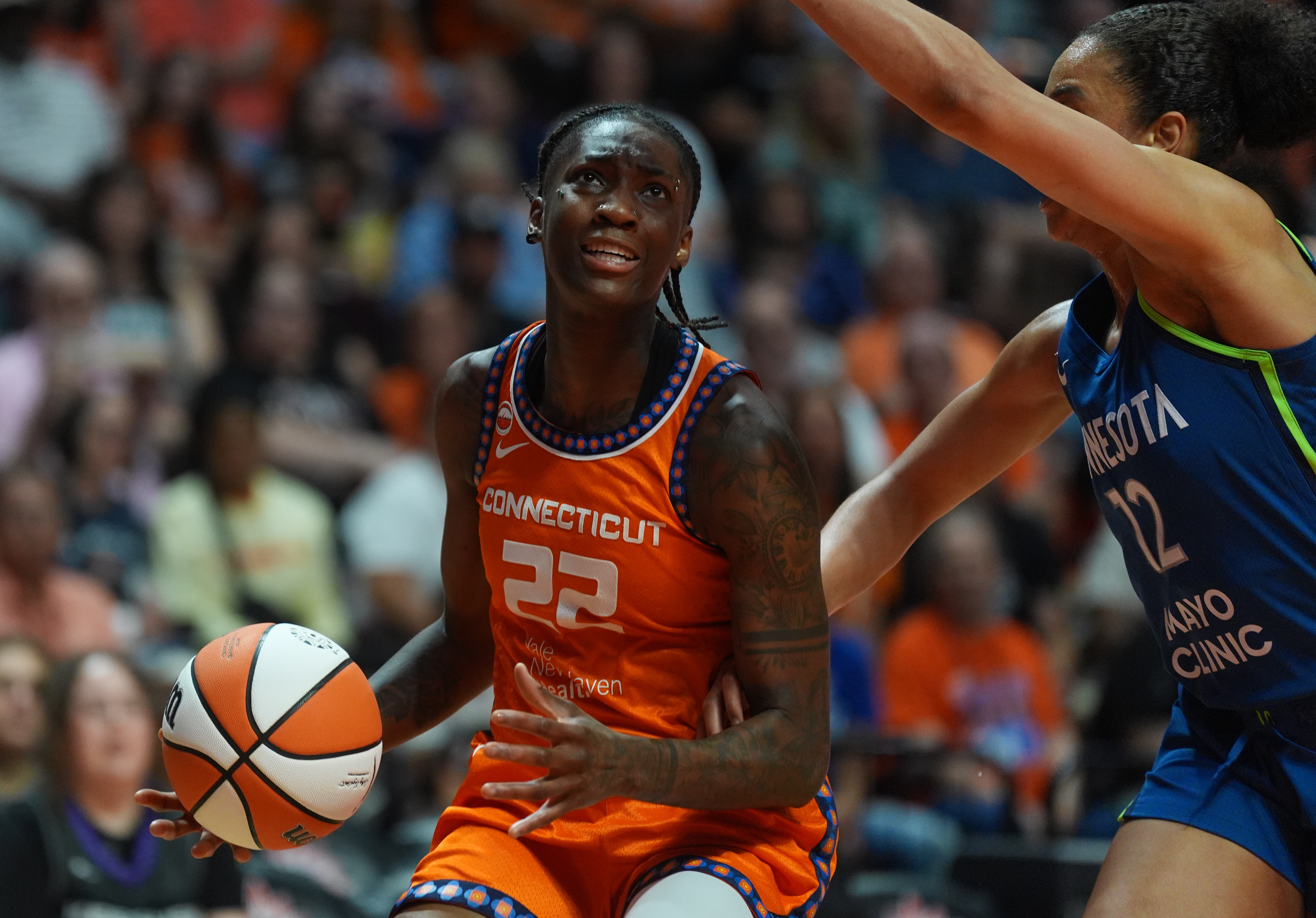Sun's Saniya Rivers wheeled off after awkward ankle injury, fall in matchup vs. Lynx