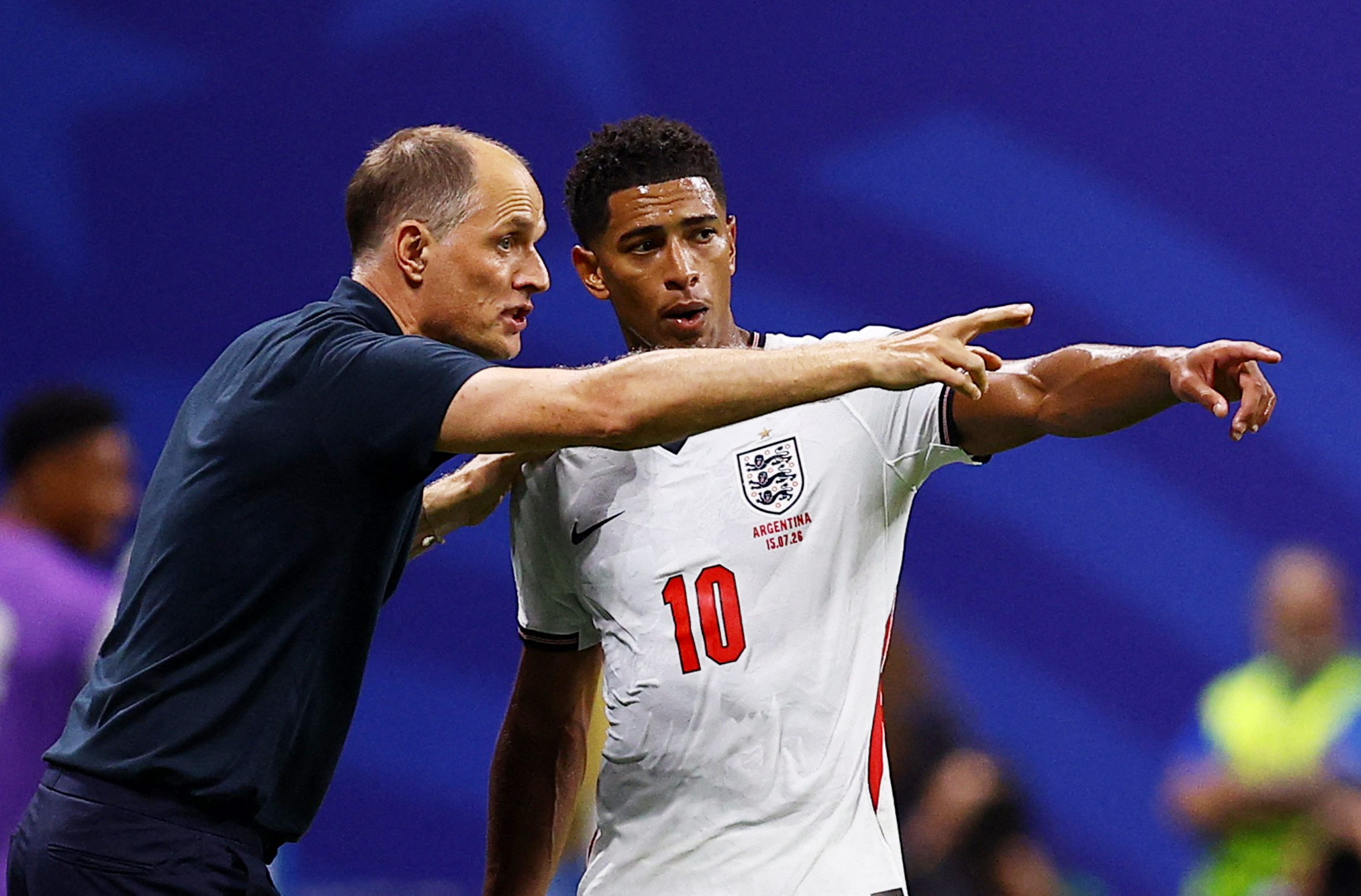 Soccer Football - FIFA World Cup 2026 - Semi Final - England v Argentina - Atlanta Stadium, Atlanta, Georgia, U.S. - July 15, 2026 England manager Thomas Tuchel gives instructions to Jude Bellingham REUTERS/Agustin Marcarian