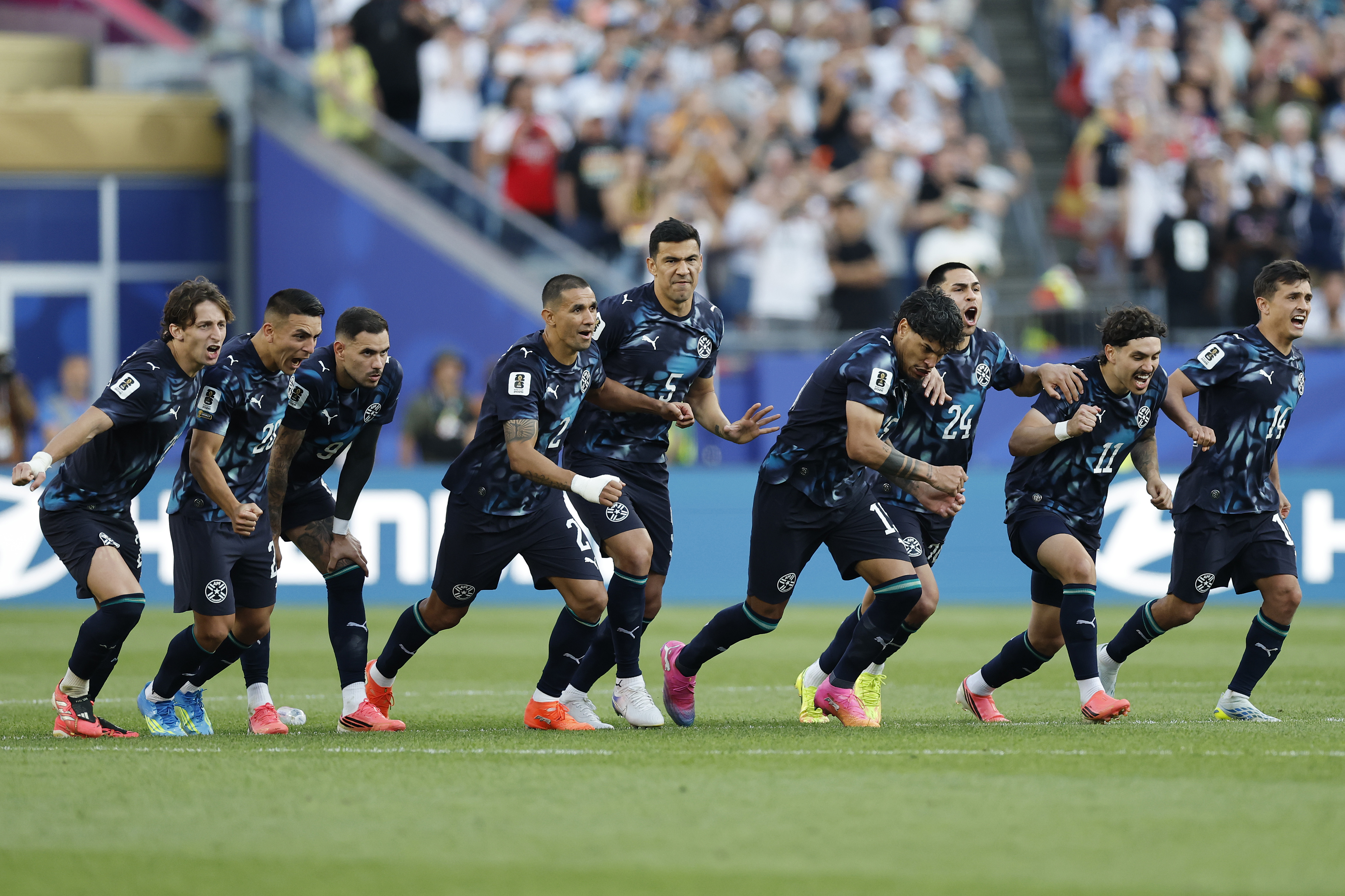 FOXBOROUGH, MASSACHUSETTS - JUNE 29: Paraguay celebrates after Jose Canale #13 scores the winning penalty in a penalty shootout during the FIFA World Cup 2026 Round Of 32 match between Germany and Paraguay at Boston Stadium on June 29, 2026 in Foxborough, Massachusetts. (Photo by Michael Reaves/Getty Images)