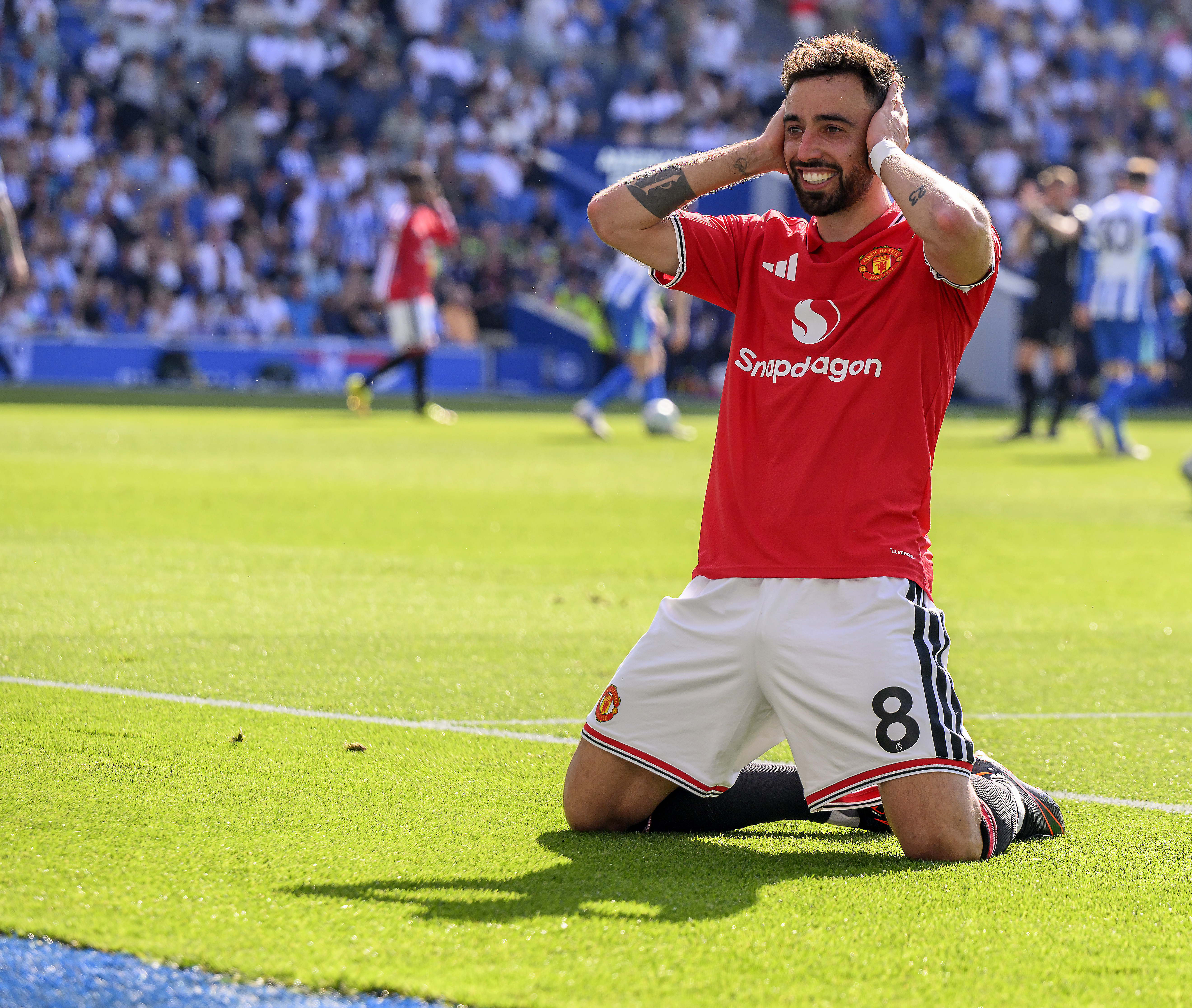 BRIGHTON, ENGLAND - MAY 24: Bruno Fernandes celebrates scoring his side's third goal during the Premier League match between Brighton & Hove Albion and Manchester United. (Photo by David Horton - CameraSport via Getty Images)