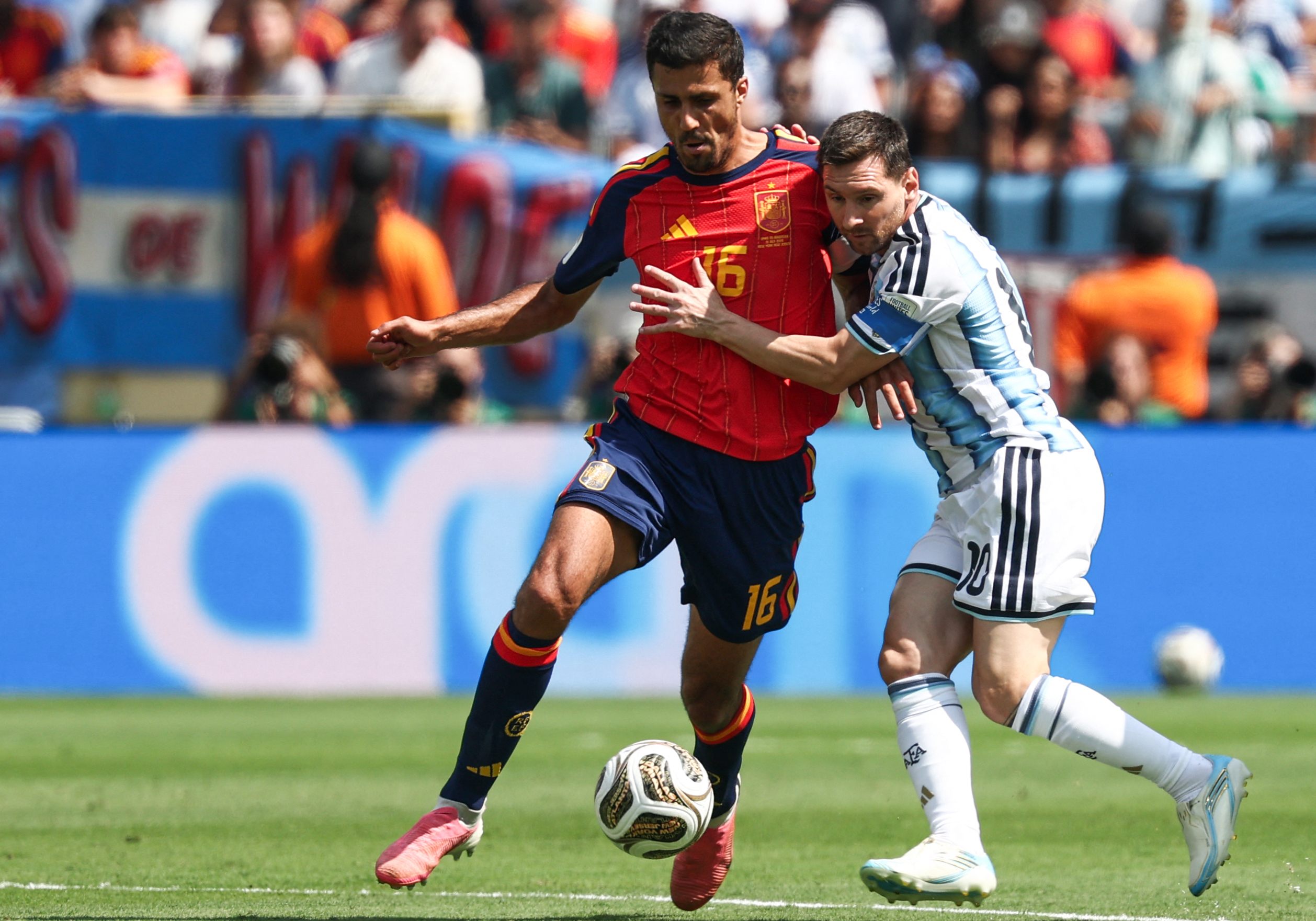 Spain's midfielder #16 Rodri (L) and Argentina's forward #10 Lionel Messi fight for the ball during the 2026 World Cup football tournament final match between Spain and Argentina at the New York/New Jersey Stadium in East Rutherford on July 19, 2026.  (Photo by FRANCK FIFE / AFP via Getty Images)