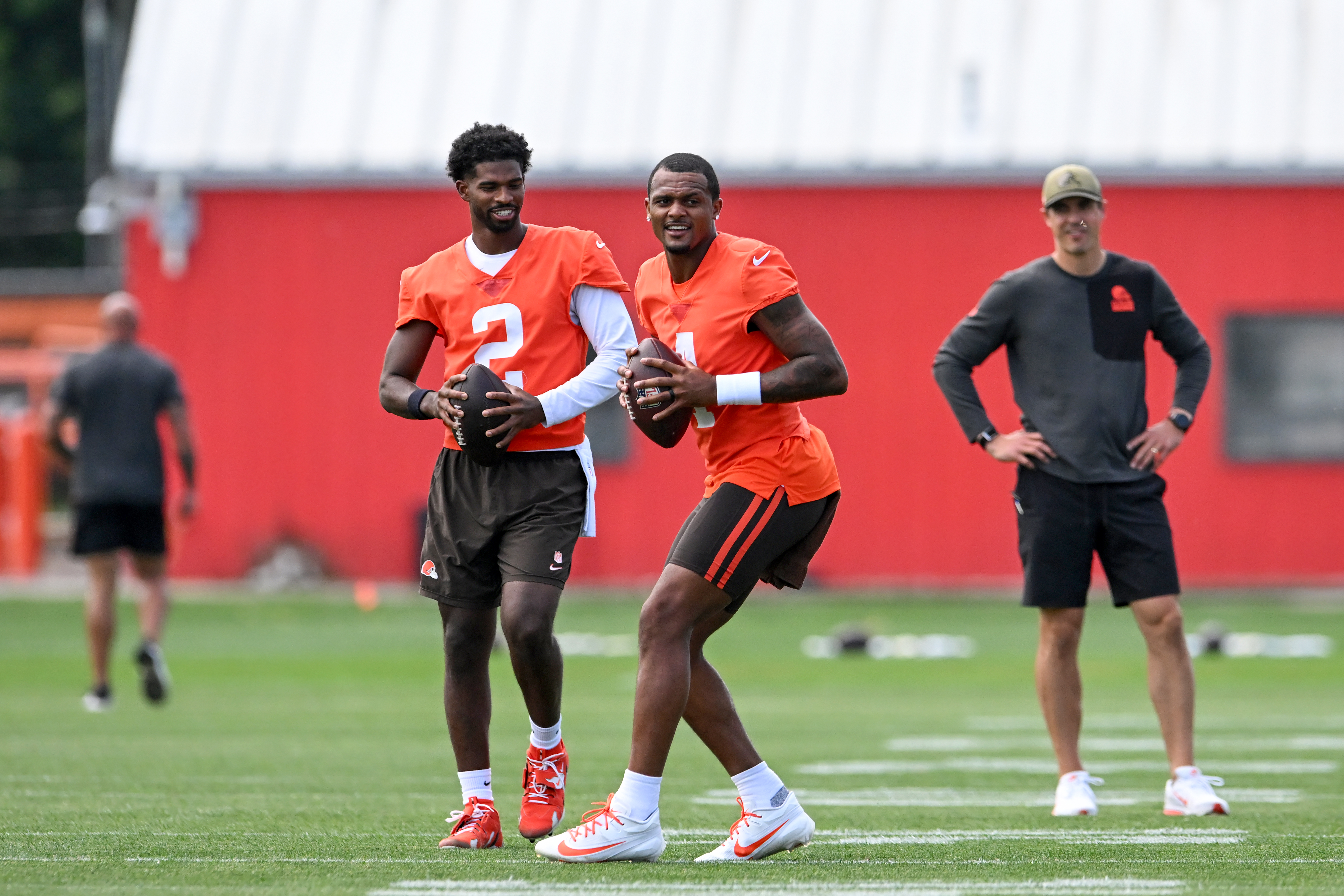 BEREA, OHIO - JUNE 11: Deshaun Watson #4 and Shedeur Sanders #2 of the Cleveland Browns run a drill during the Cleveland Browns Mandatory Minicamp at CrossCountry Mortgage Campus on June 11, 2026 in Berea, Ohio. (Photo by Nick Cammett/Getty Images)