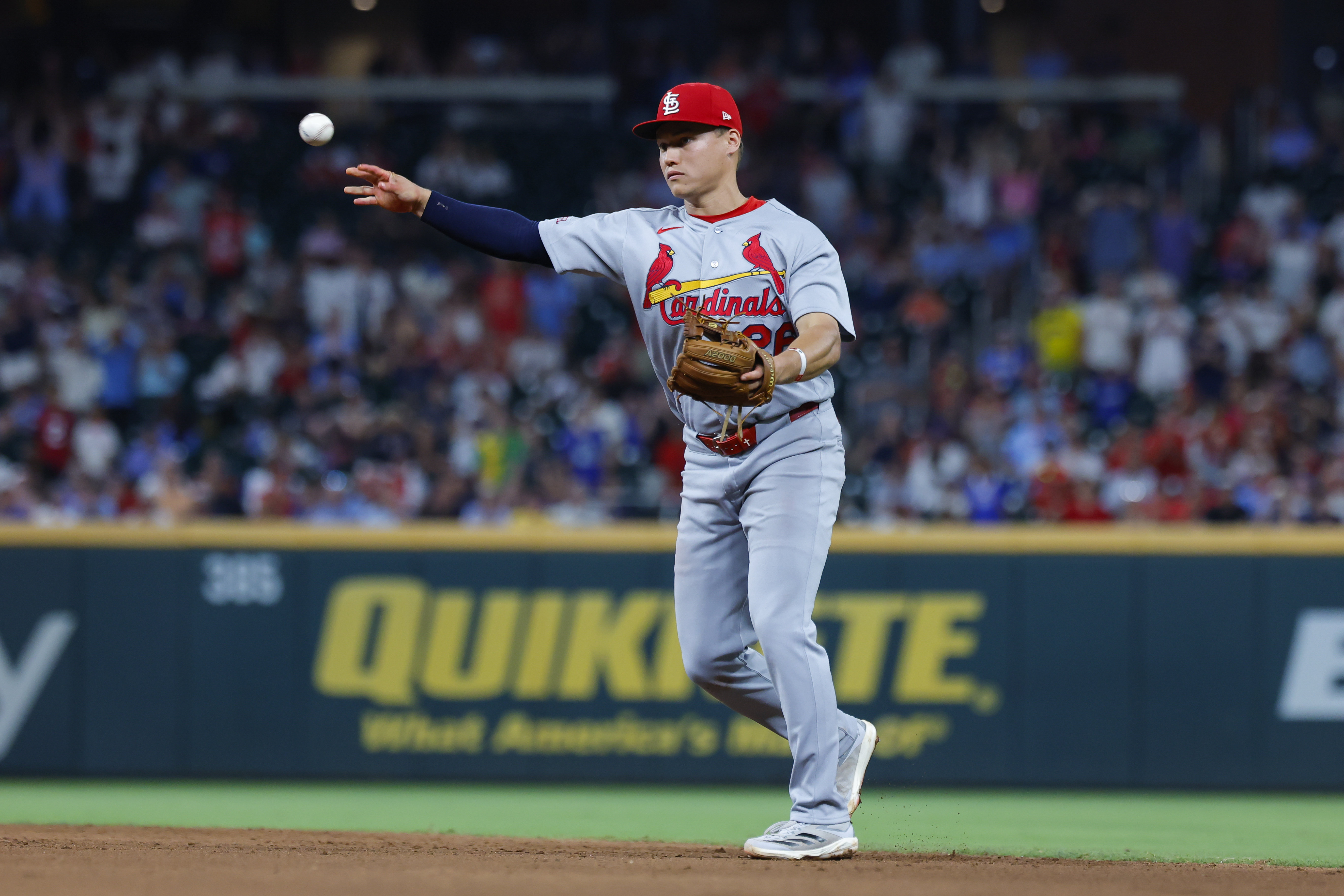 ATLANTA, GEORGIA - JUNE 30: JJ Wetherholt #26 of the St. Louis Cardinals throws to first base during the eighth inning against the Atlanta Braves at Truist Park on June 30, 2026 in Atlanta, Georgia. (Photo by Todd Kirkland/Getty Images)