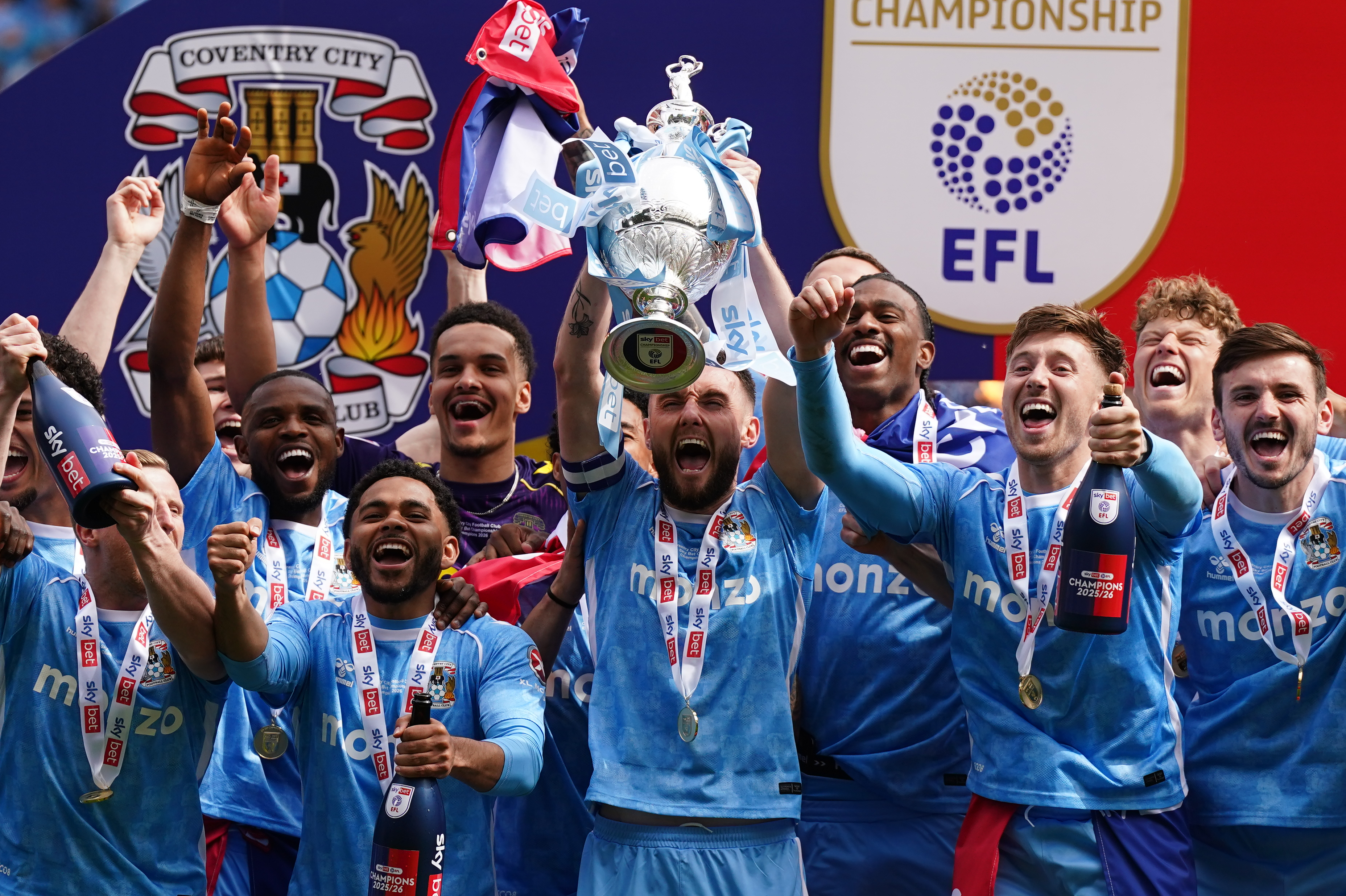 Coventry City's captain Matt Grimes and his team mates lift the Sky Bet Championship trophy. (Photo by Jacob King/PA Images via Getty Images)