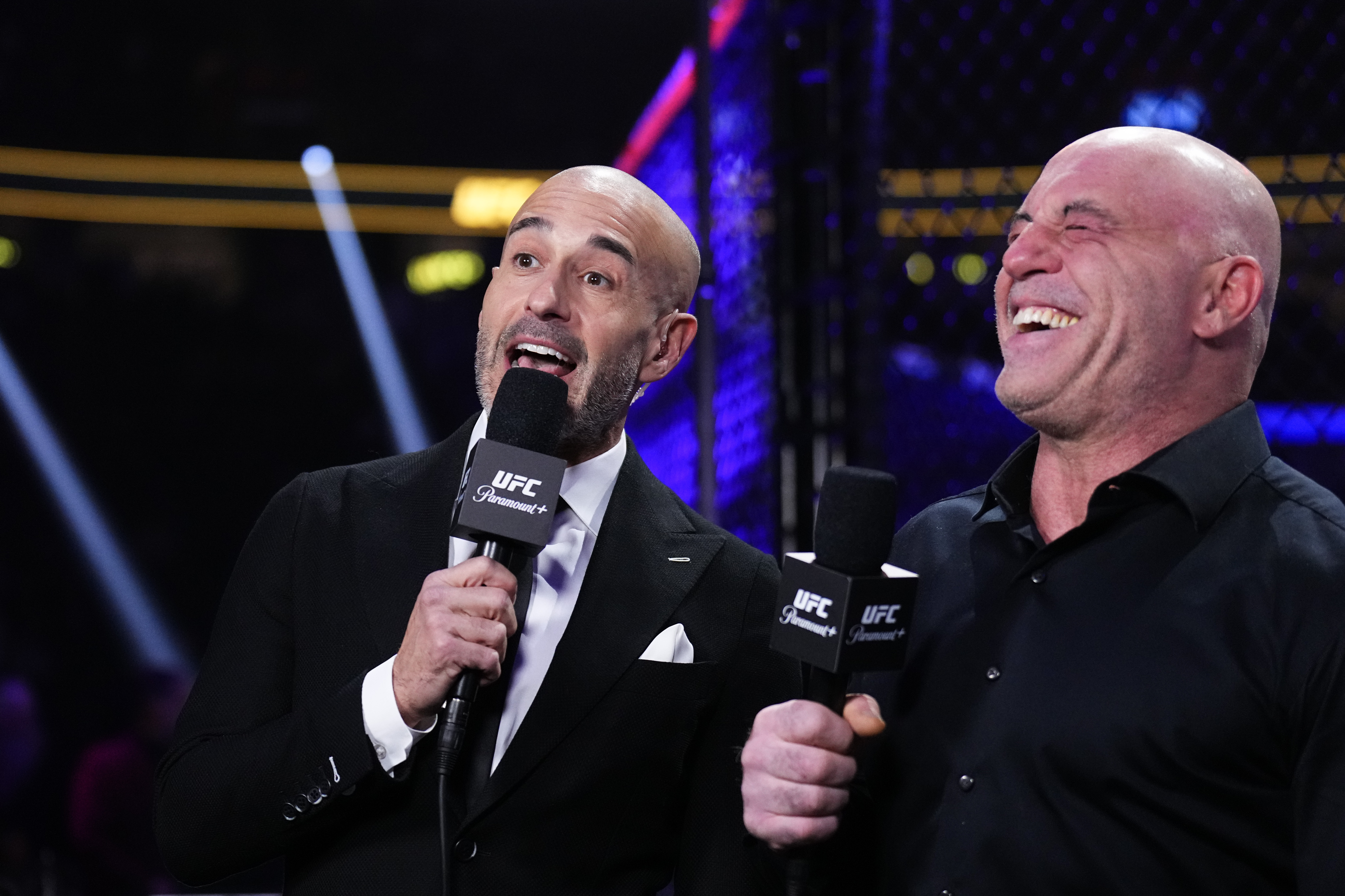 LAS VEGAS, NEVADA - JANUARY 24: UFC commentators Jon Anik, and Joe Rogan speak ringside prior to the UFC 324 event at T-Mobile Arena on January 24, 2026 in Las Vegas, Nevada. (Photo by Chris Unger/Zuffa LLC)