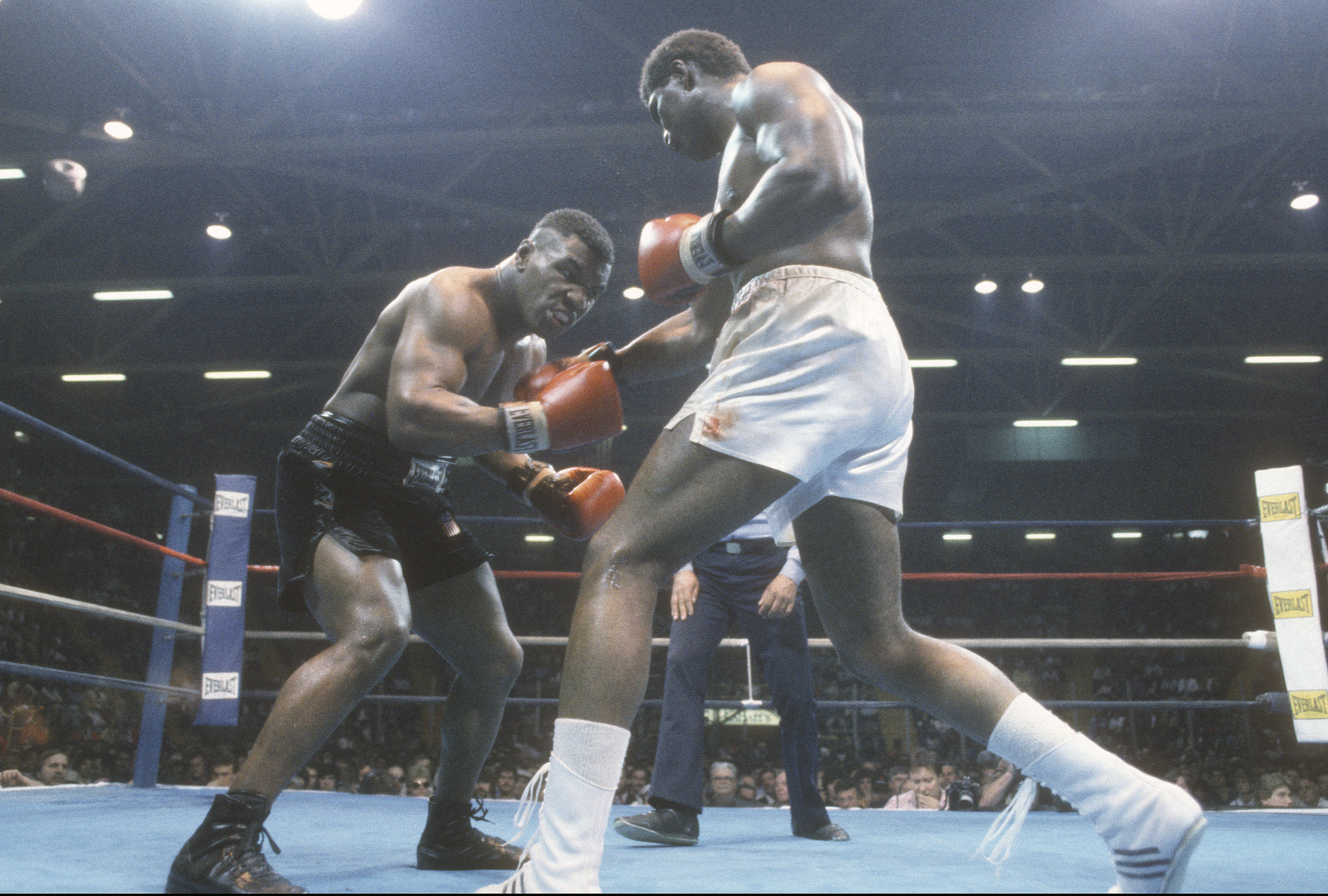GLENS FALLS, NY - MAY 3: Mike Tyson and James Tillis fight during a Heavyweight match May 3, 1986 at The Civic Center in Glens Falls, New York. Tyson won the fight on a unanimous decision in 10 rounds. (Photo by Focus on Sport/Getty Images)