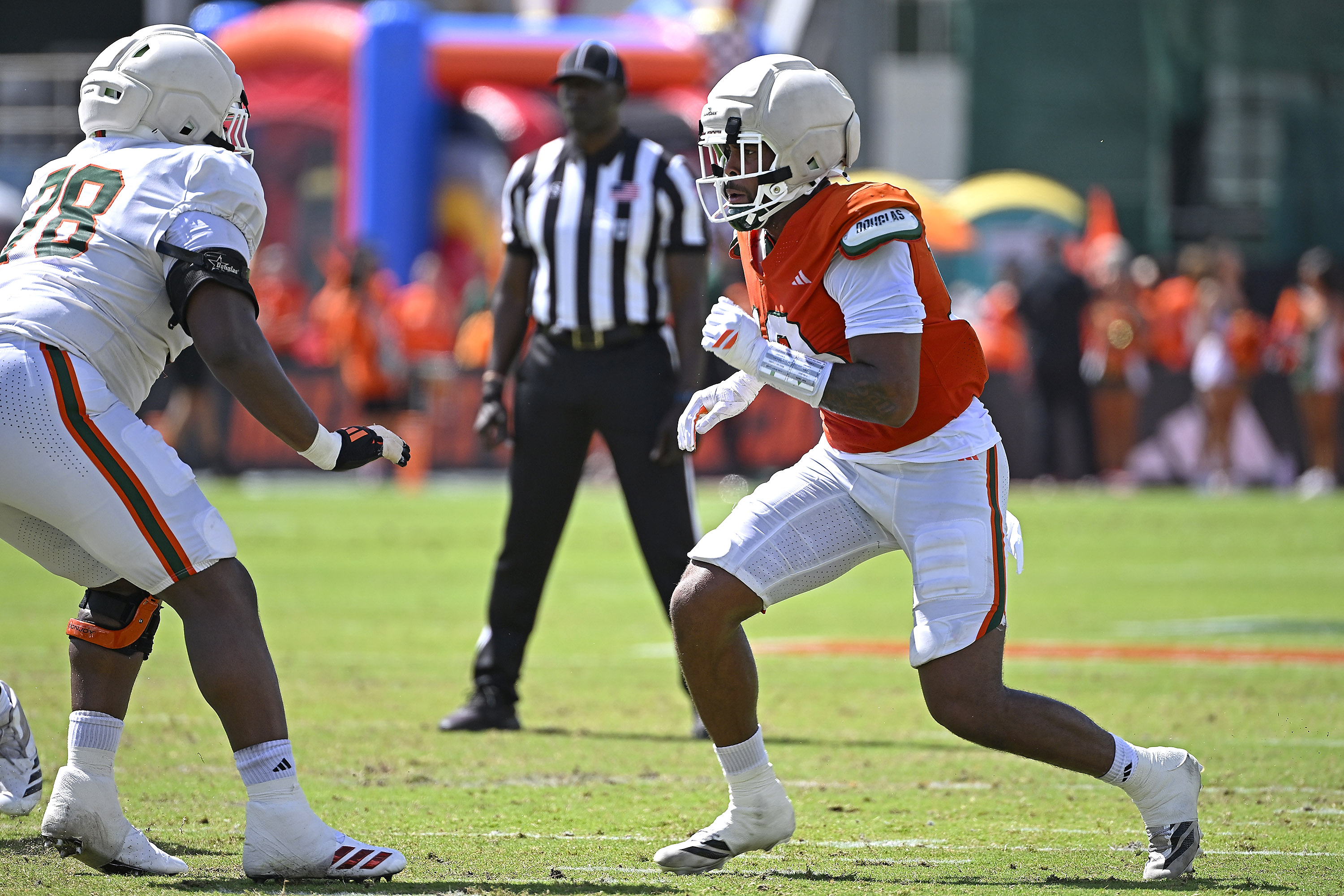 CORAL GABLES, FL - APRIL 18:  Miami defensive lineman Damon Wilson II (10) attempts to get around offensive lineman Matthew McCoy (78) as the Miami Hurricanes played their spring game on April 18, 2026, at Cobb Stadium in Coral Gables, Florida. (Photo by Samuel Lewis/Icon Sportswire via Getty Images)