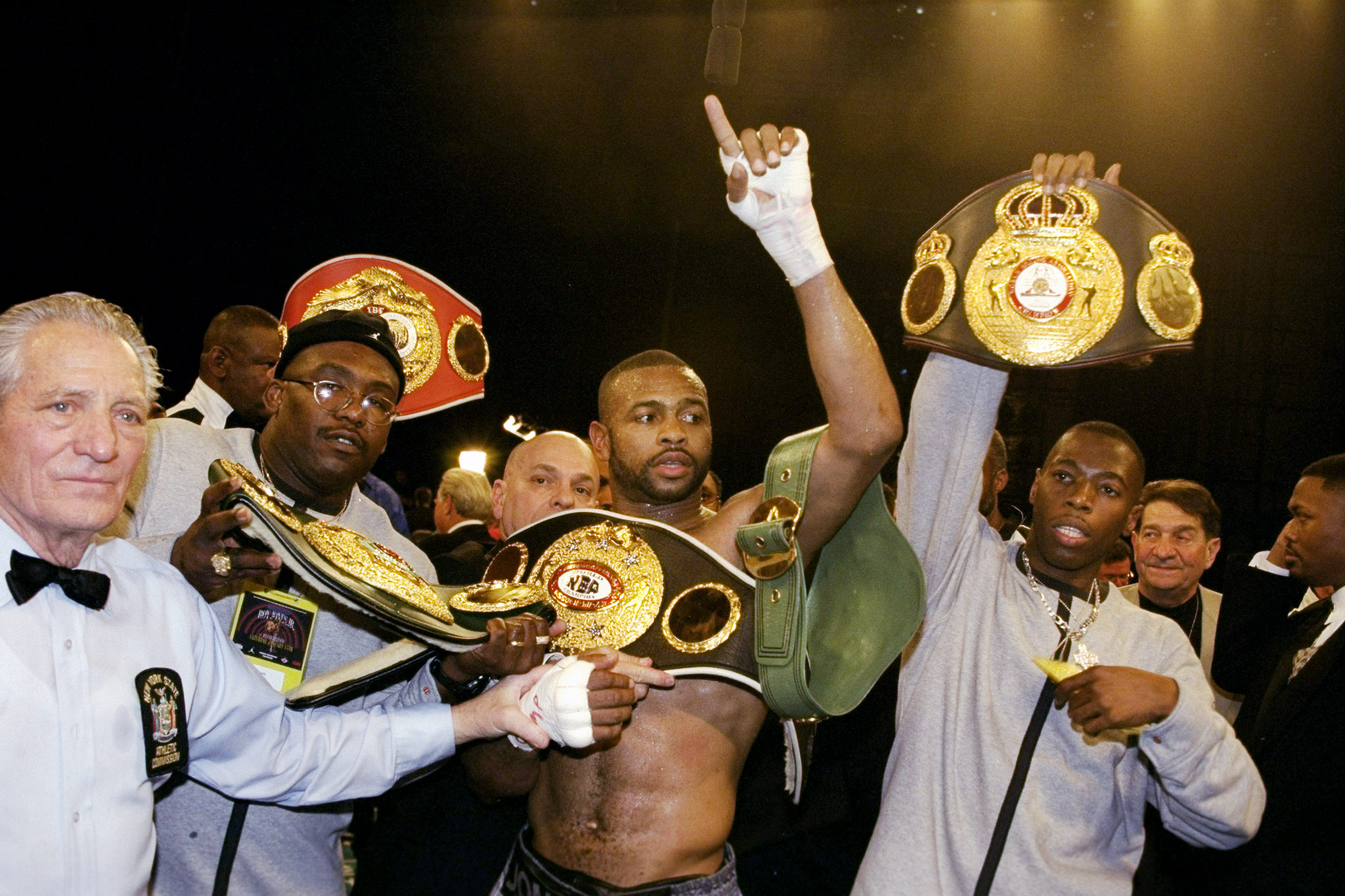 UNITED STATES - JANUARY 15:  Roy Jones Jr.is surrounded by his various boxing federation championship belts after successfully defending his light-heavyweight title against David Telesco at Radio City Music Hall.  (Photo by Todd Maisel/NY Daily News Archive via Getty Images)