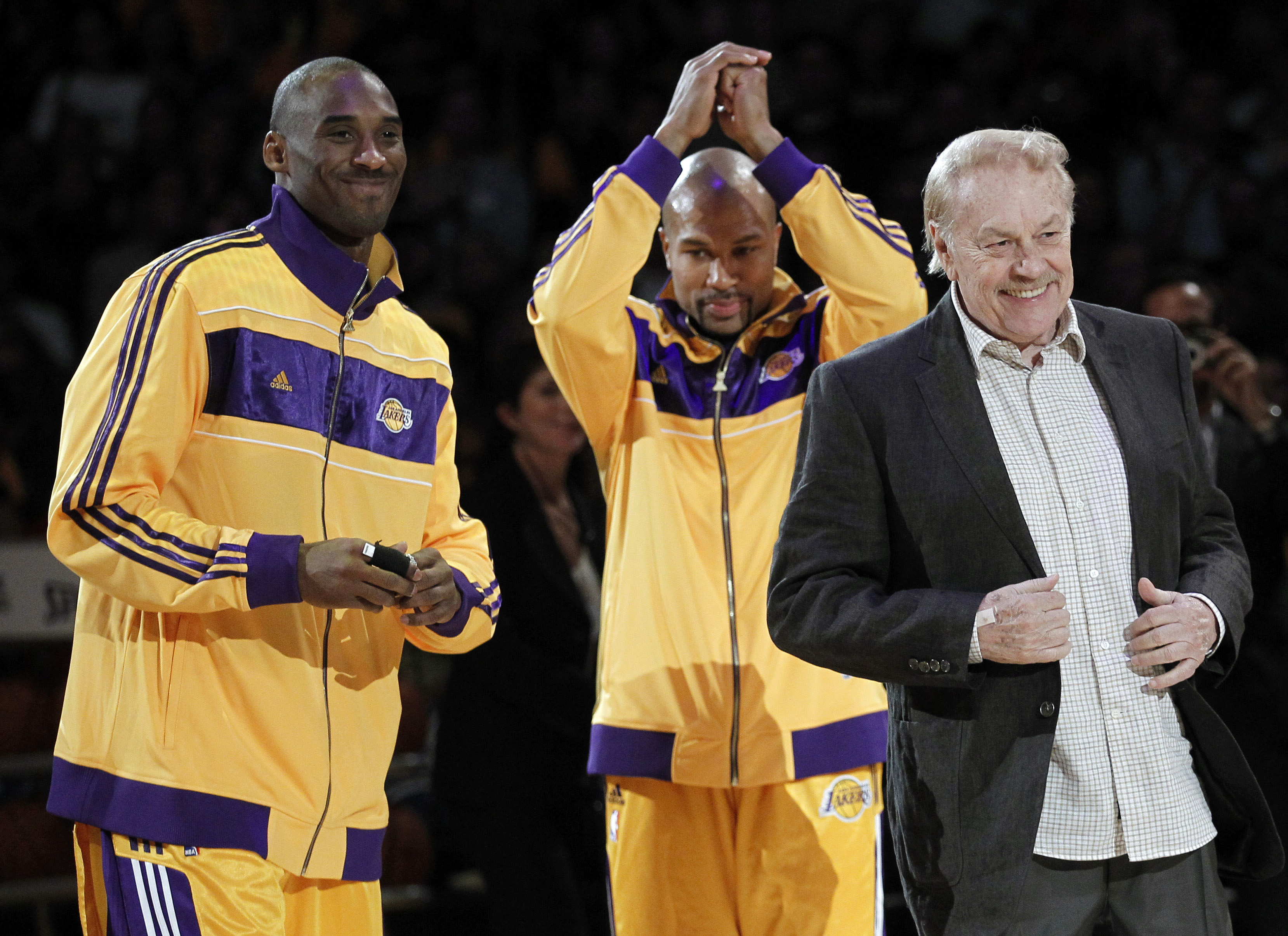 Jerry Buss celebrates the last of the Lakers championships under his watch in 2010 with Kobe Bryant and Derek Fisher.