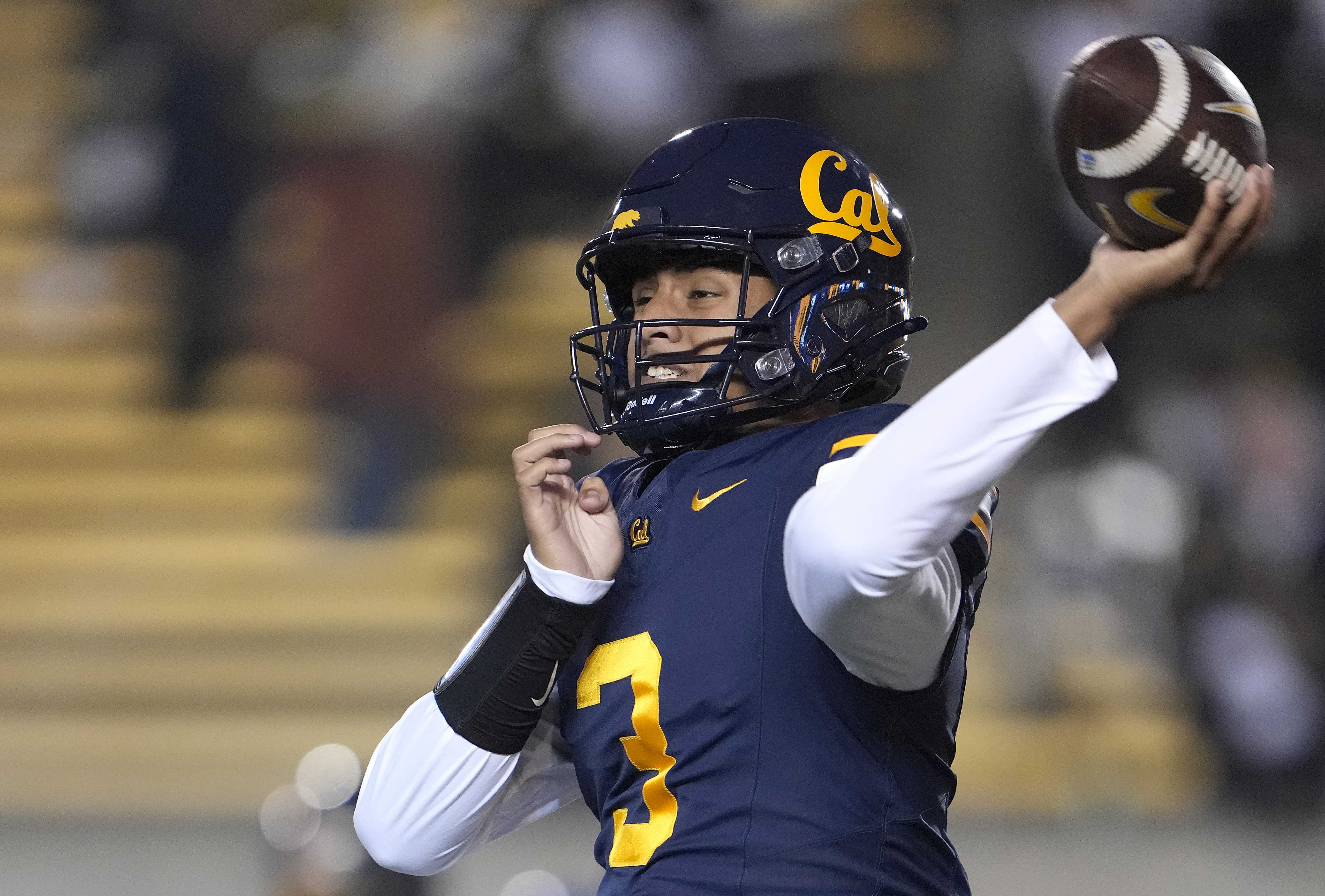 BERKELEY, CALIFORNIA - NOVEMBER 29: Jaron-Keawe Sagapolutele #3 of the California Golden Bears throws a pass against the Southern Methodist University Mustangs in the first half at California Memorial Stadium on November 29, 2025 in Berkeley, California. (Photo by Thearon W. Henderson/Getty Images)
