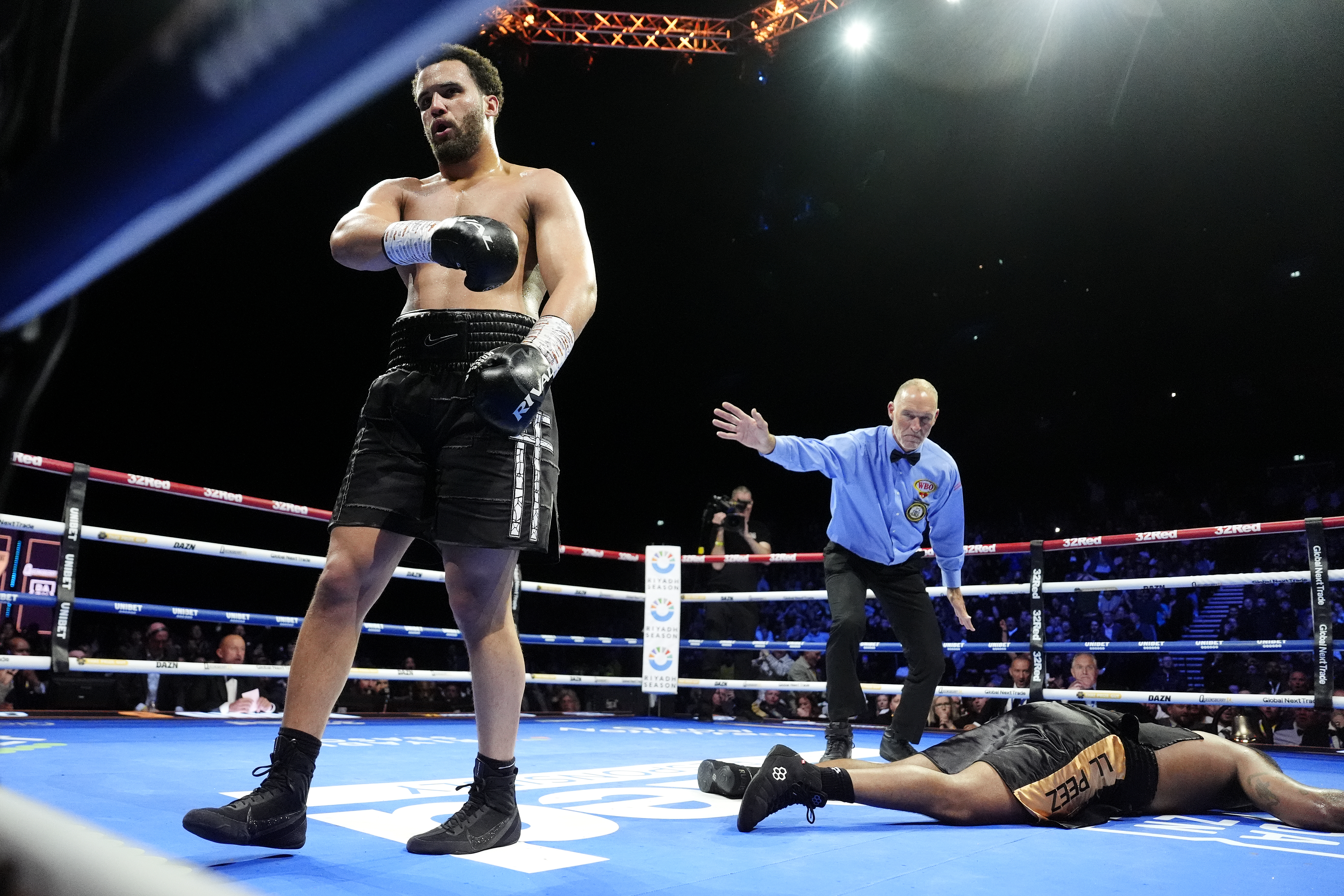 Moses Itauma (left) knocks down Jermaine Franklin during their WBA International and WBO Inter-Continental Heavyweight bout at the Co-op Live Arena in Manchester. Picture date: Saturday March 28, 2026. (Photo by Nick Potts/PA Images via Getty Images)