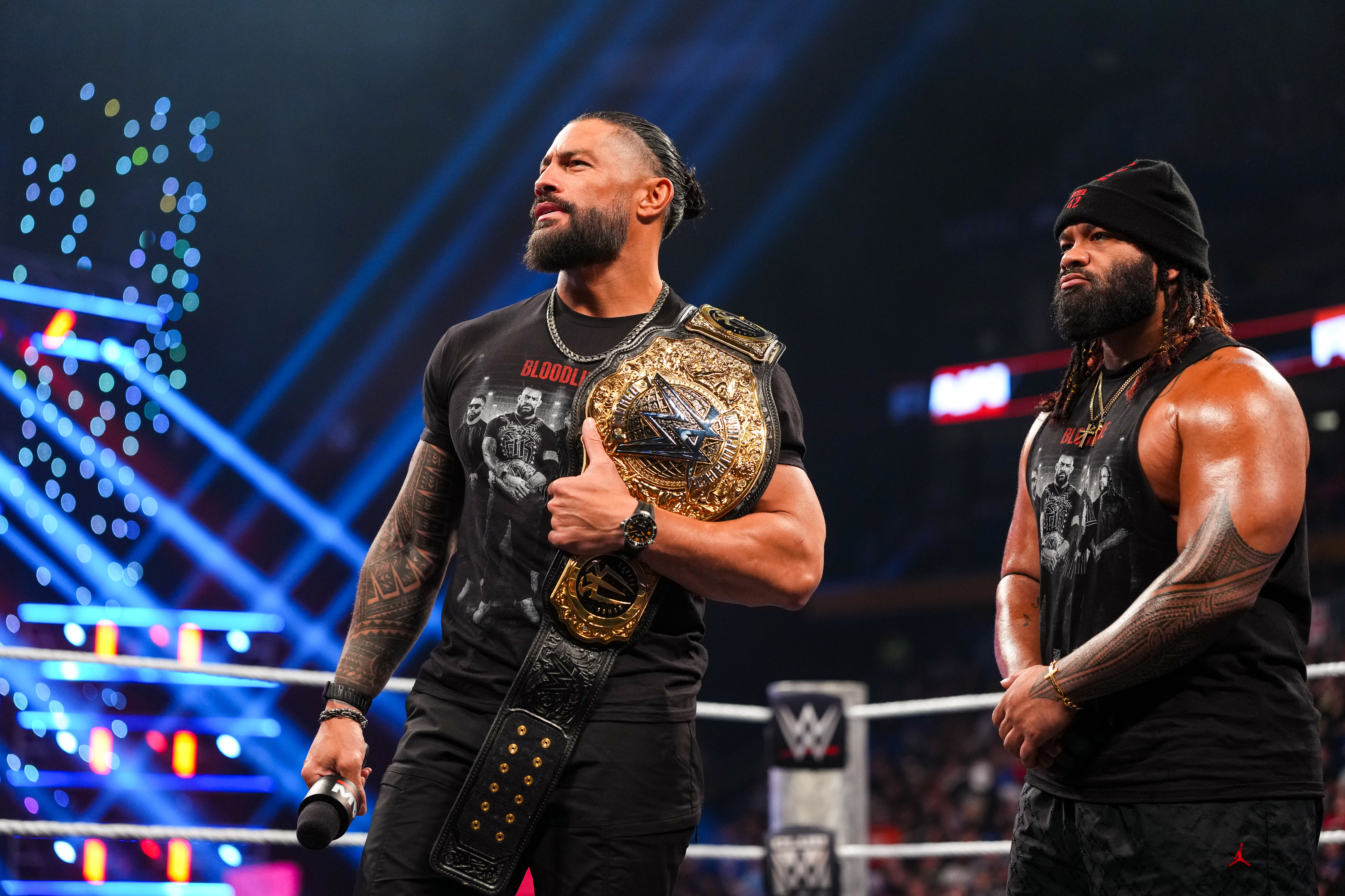 BUFFALO, NEW YORK - AUGUST 17: Roman Reigns and Jacob Fatu enter the ring during Monday Night RAW at KeyBank Center on August 17, 2026 in Buffalo, New York.  (Photo by Cooper Neill/WWE via Getty Images)