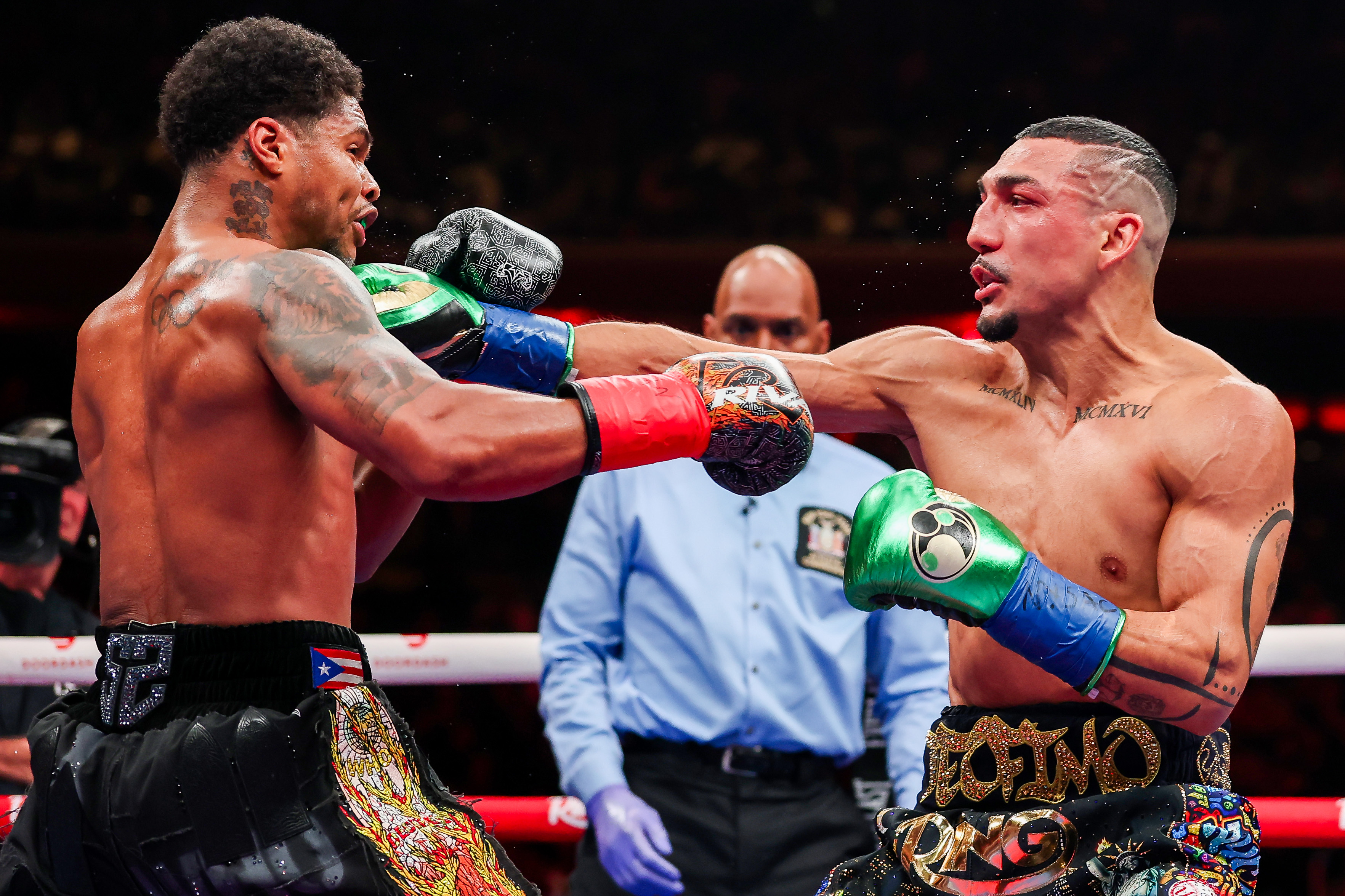 NEW YORK, NEW YORK - JANUARY 31: Teofimo Lopez punches Shakur Stevenson in the super lightweight bout for the World Boxing Organization title during The Ring 6 fight at Madison Square Garden on January 31, 2026 in New York City. (Photo by Ishika Samant/Getty Images)
