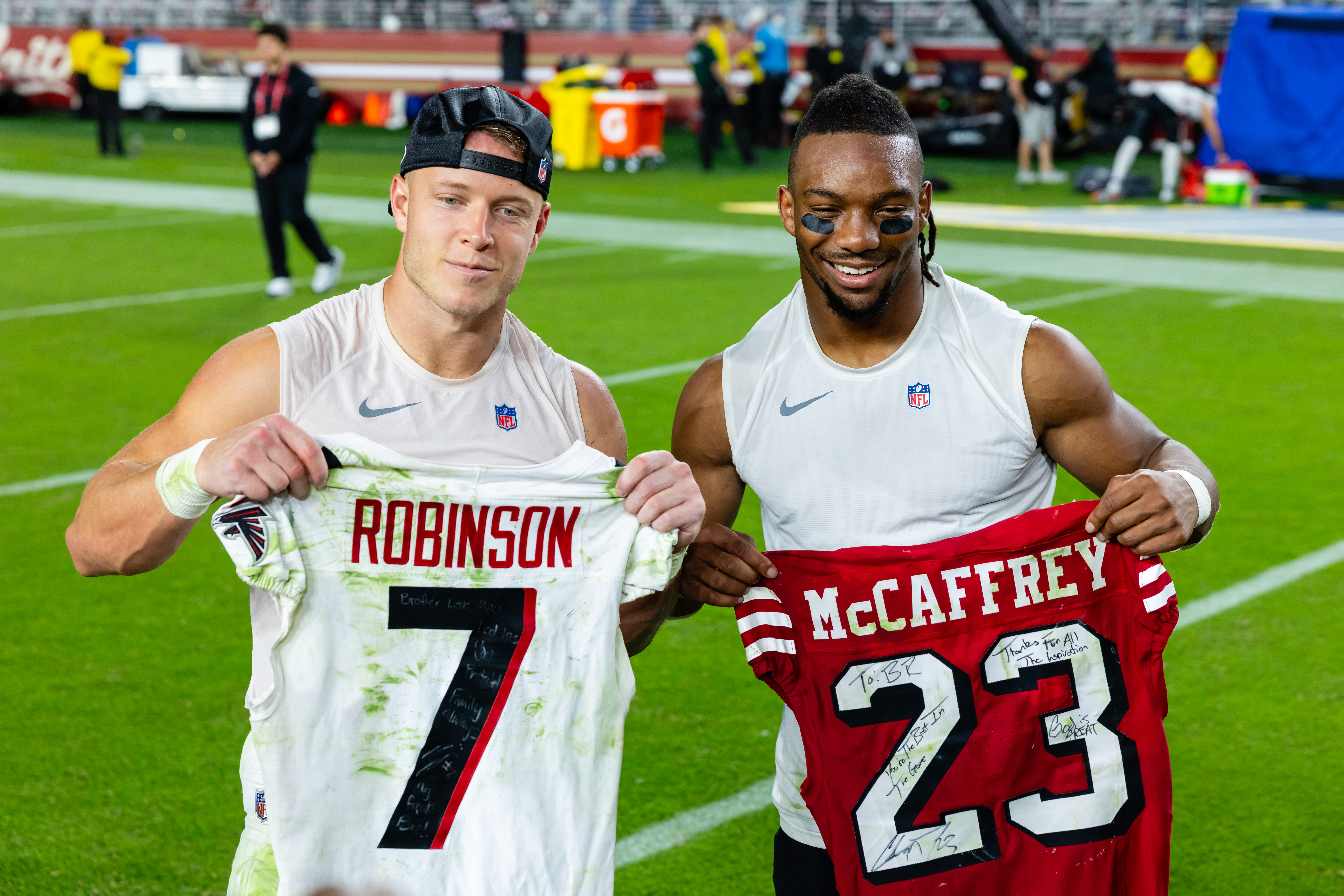 SANTA CLARA, CA - OCTOBER 19: Christian McCaffrey #23 of the San Francisco 49ers and Bijan Robinson #7 of the Atlanta Falcons exchange jerseys after a NFL game on October 19, 2025 at Levi's Stadium in Santa Clara, CA. (Photo by Matthew Huang/Icon Sportswire via Getty Images)