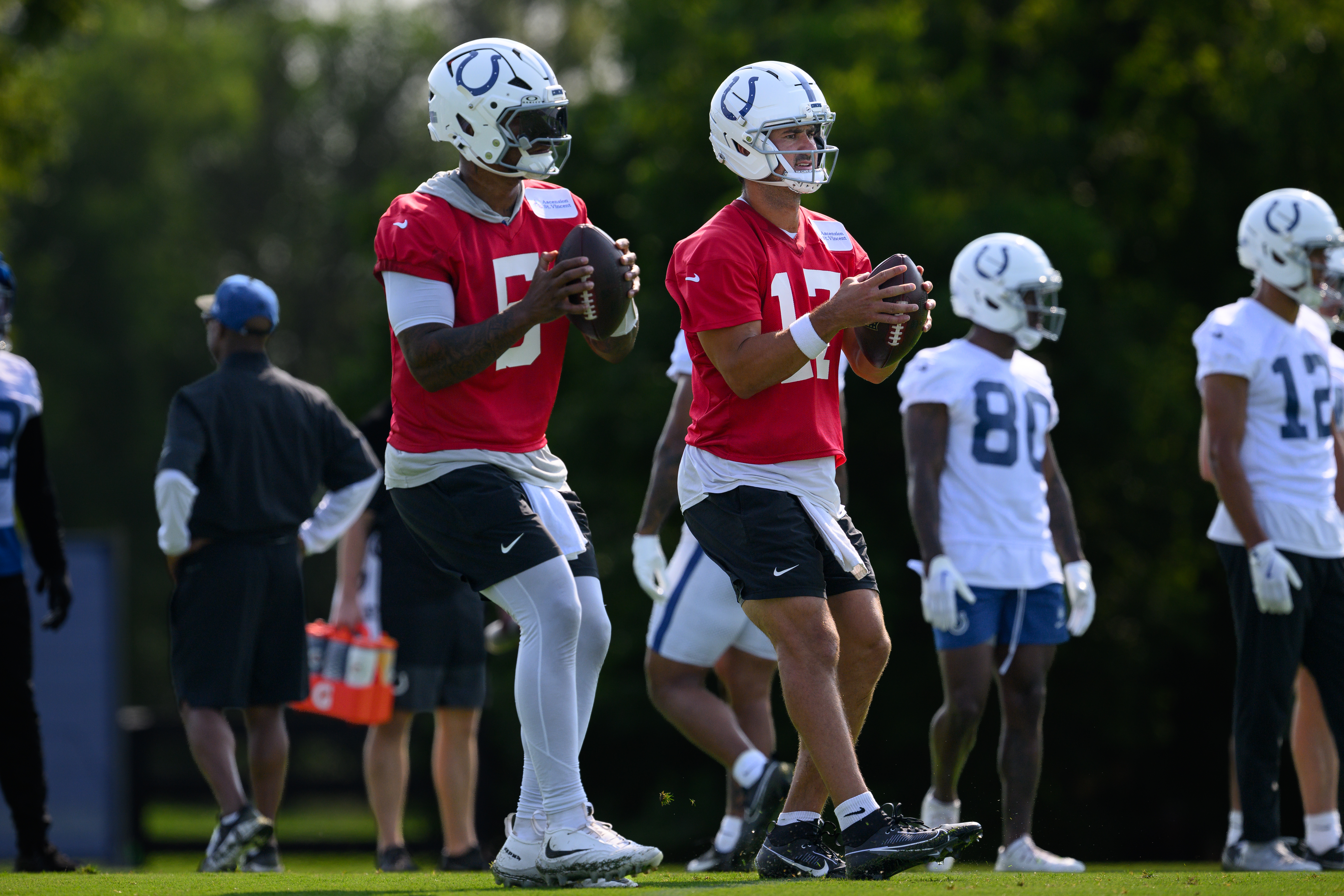 WESTFIELD, IN - JULY 29: Indianapolis Colts quarterback Anthony Richardson Sr. (5) and Indianapolis Colts quarterback Daniel Jones (17) run through a drill during the Indianapolis Colts training camp practice on July 29, 2026 at the Grand Park Sports Campus in Westfield, IN. (Photo by Zach Bolinger/Icon Sportswire via Getty Images)