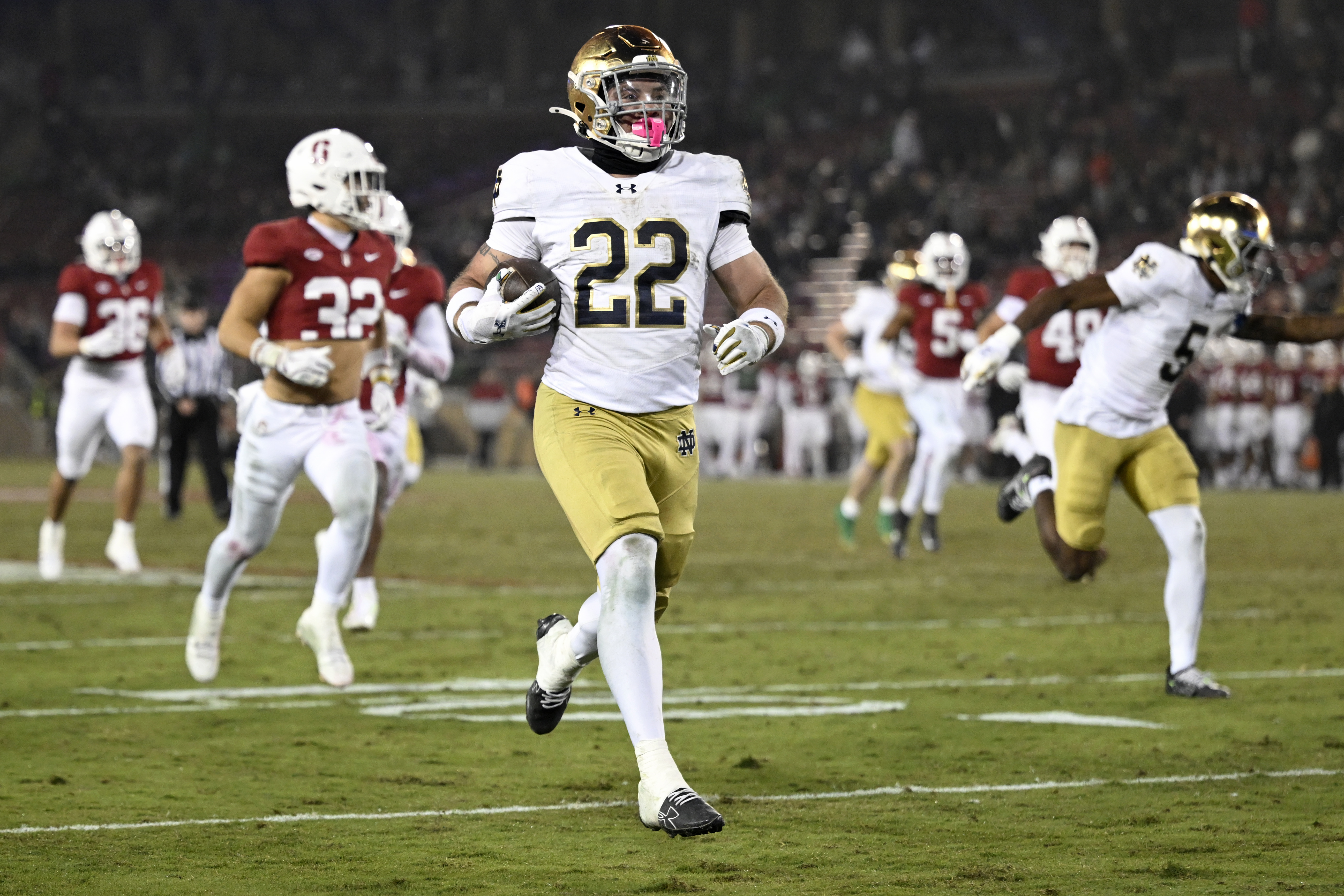 STANFORD, CALIFORNIA - NOVEMBER 29: Aneyas Williams #22 of the Notre Dame Fighting Irish runs the ball for a touchdown against the Stanford Cardinal in the fourth quarter at Stanford Stadium on November 29, 2025 in Stanford, California. (Photo by Eakin Howard/Getty Images)