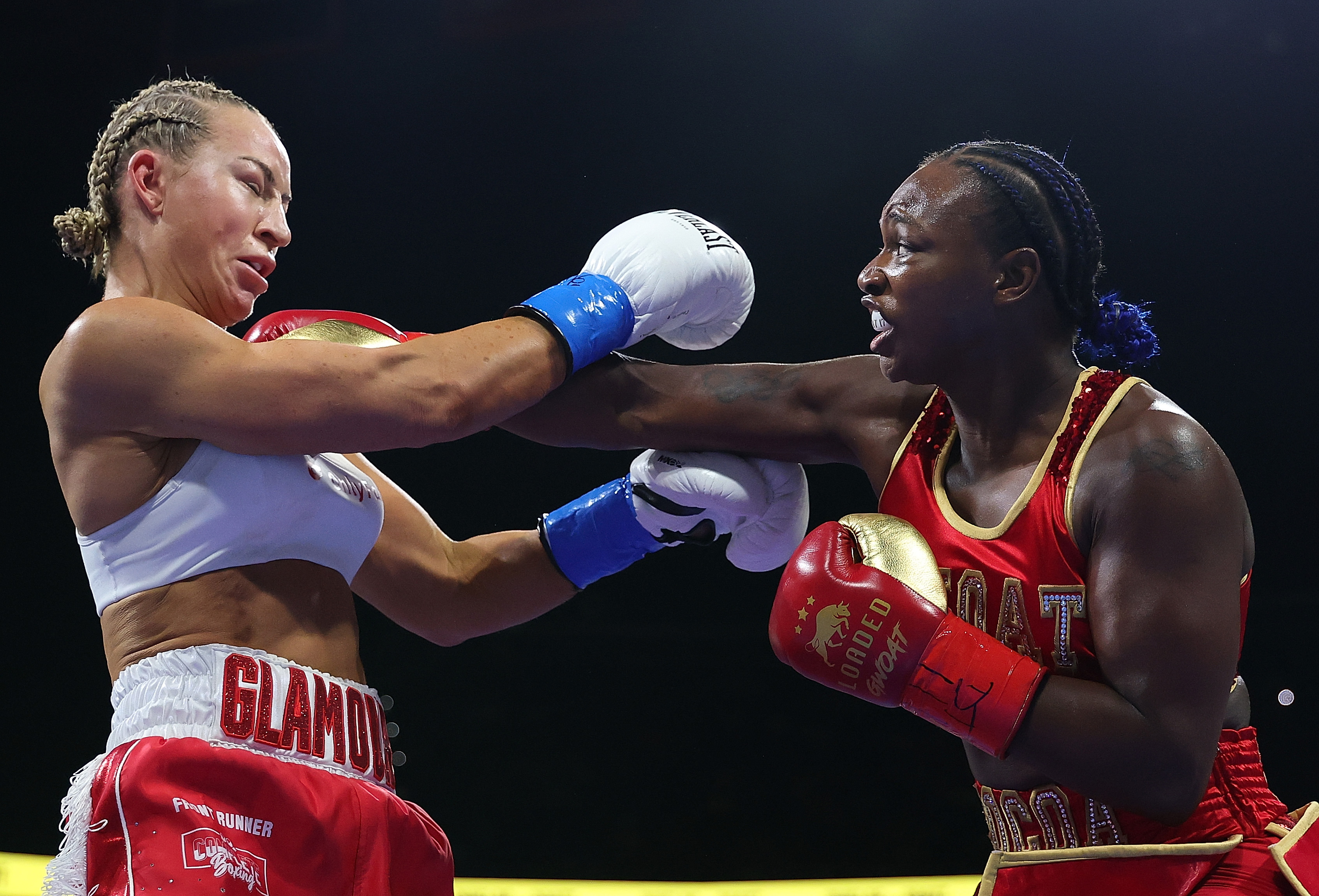 ATLANTA, GEORGIA - AUGUST 16:  Claressa Shields throws a punch at Kaye Scott of Australia during the first round of their WBC World & WBA World Female Middleweight Title bout at State Farm Arena on August 16, 2026 in Atlanta, Georgia. (Photo by Kevin C. Cox/Getty Images)