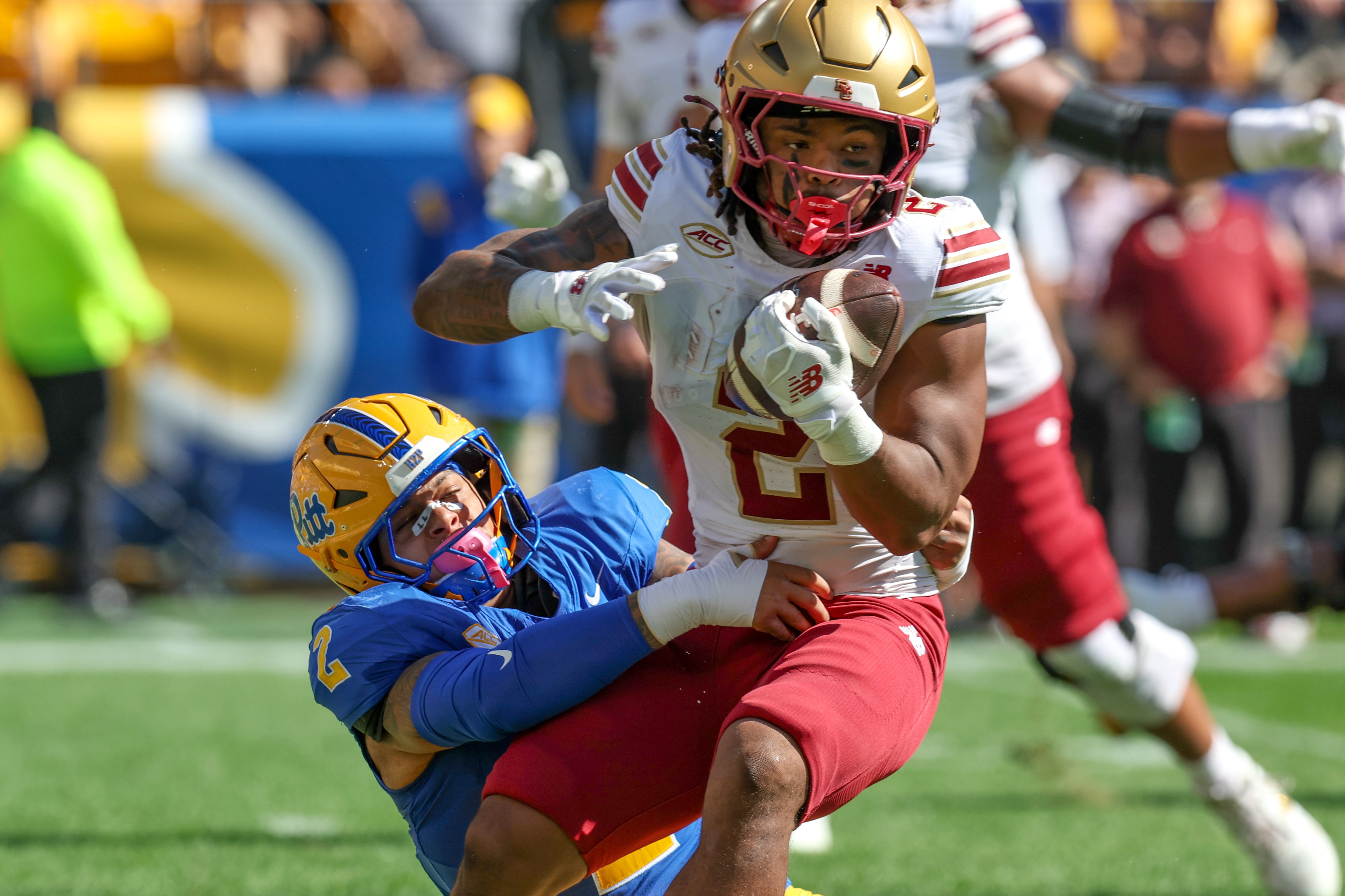 PITTSBURGH, PA - OCTOBER 04: Pittsburgh Panthers defensive lineman Isaiah Neal (2) attempts to tackle Boston College Eagles running back Turbo Richard (2) during the first quarter of the college football game between the Boston College Eagles and Pittsburgh Panthers on October 4, 2025, at Acrisure Stadium in Pittsburgh, PA. (Photo by Frank Jansky/Icon Sportswire via Getty Images)