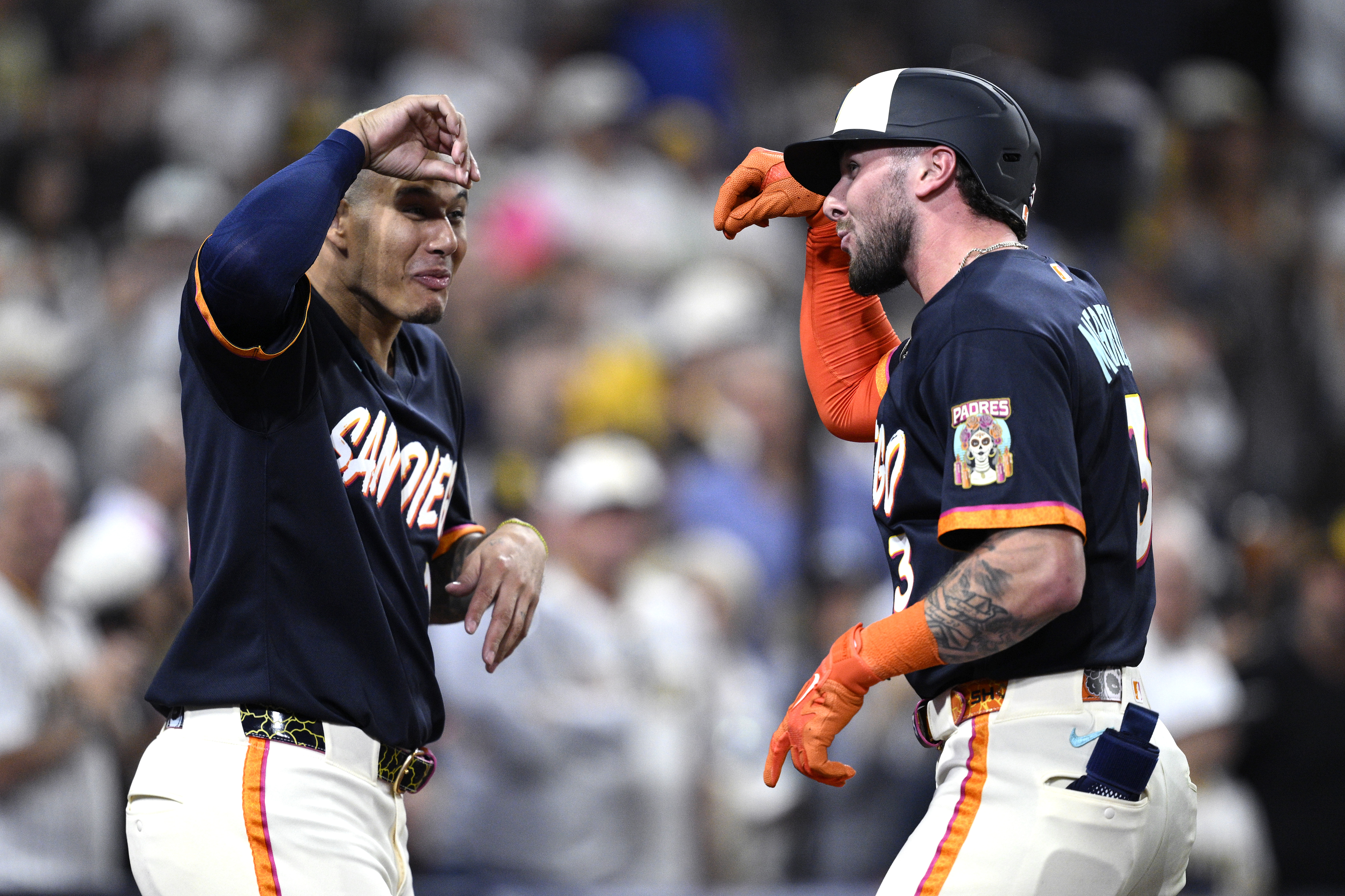 With 8 games to go, the NL wild-card race is a 3-way tie between the Cubs, Phillies and Padres