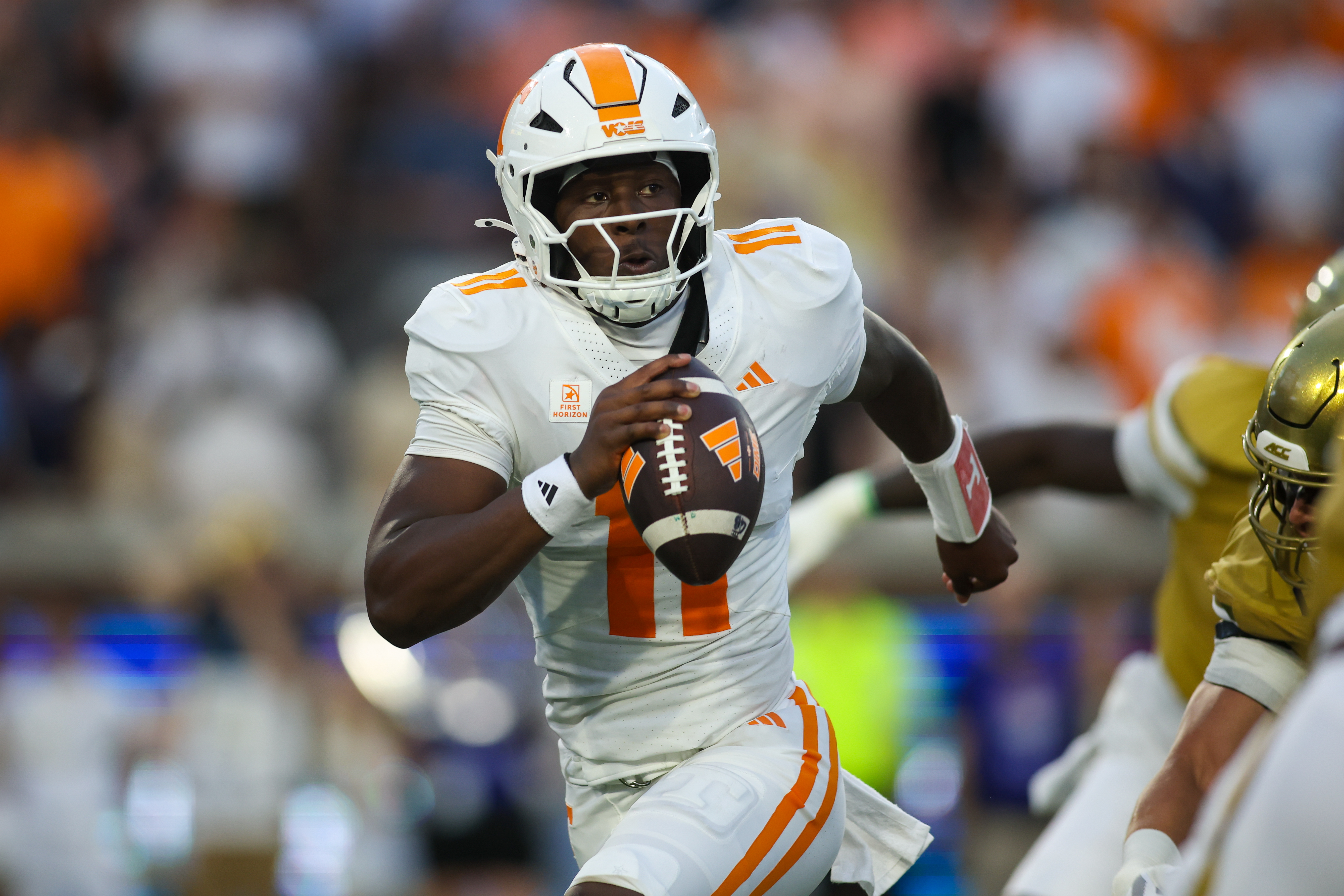 Tennessee Volunteers quarterback Faizon Brandon (11) has impressed through three weeks as a freshman. (Brett Davis-Imagn Images)