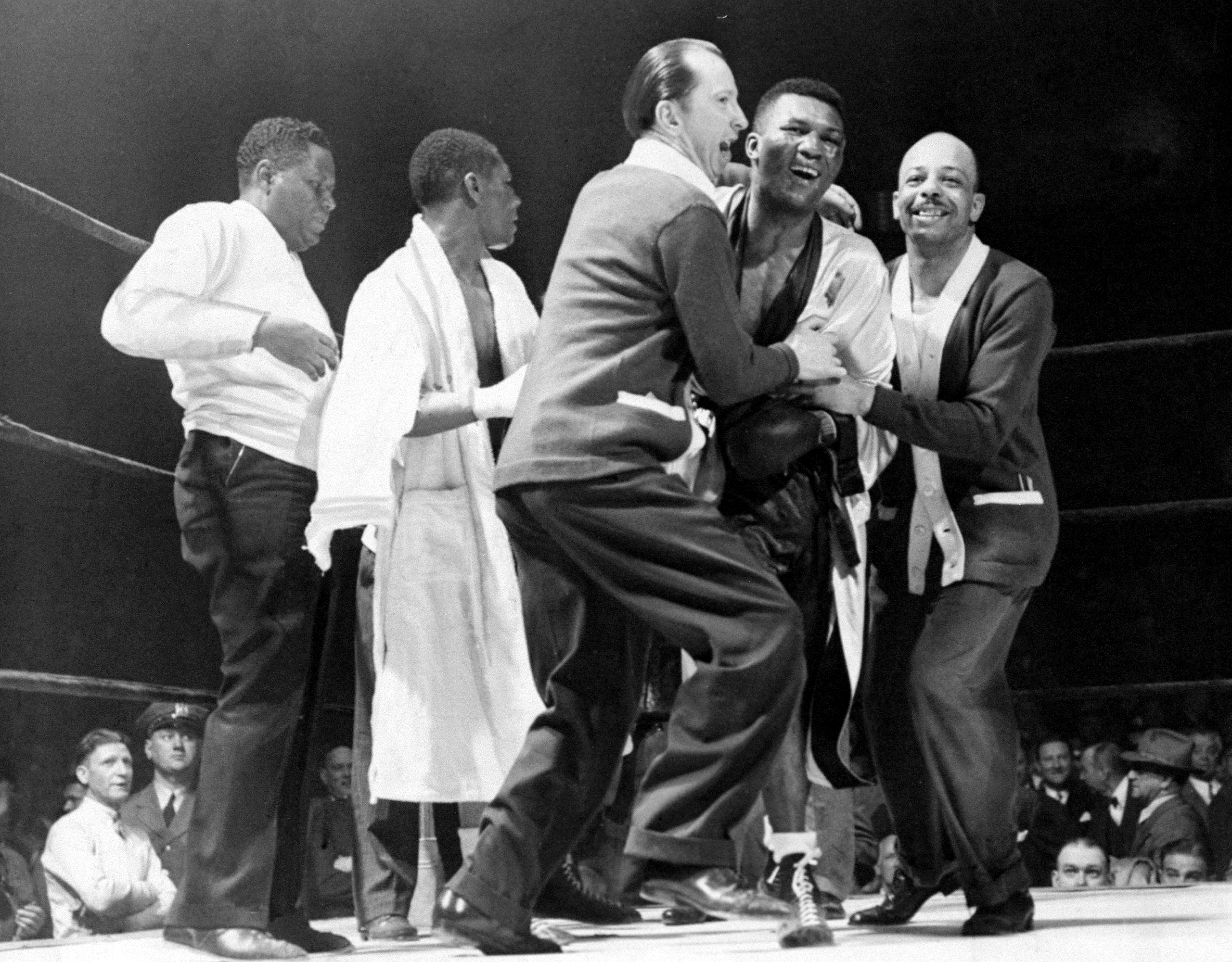 UNITED STATES - MAY 21:  Bob Montgomery rejoices as he hears the decision giving him a victory over Beau Jack and the lightweight championship of the world at Madison Square Garden.  (Photo by Hank Olen/NY Daily News Archive via Getty Images)