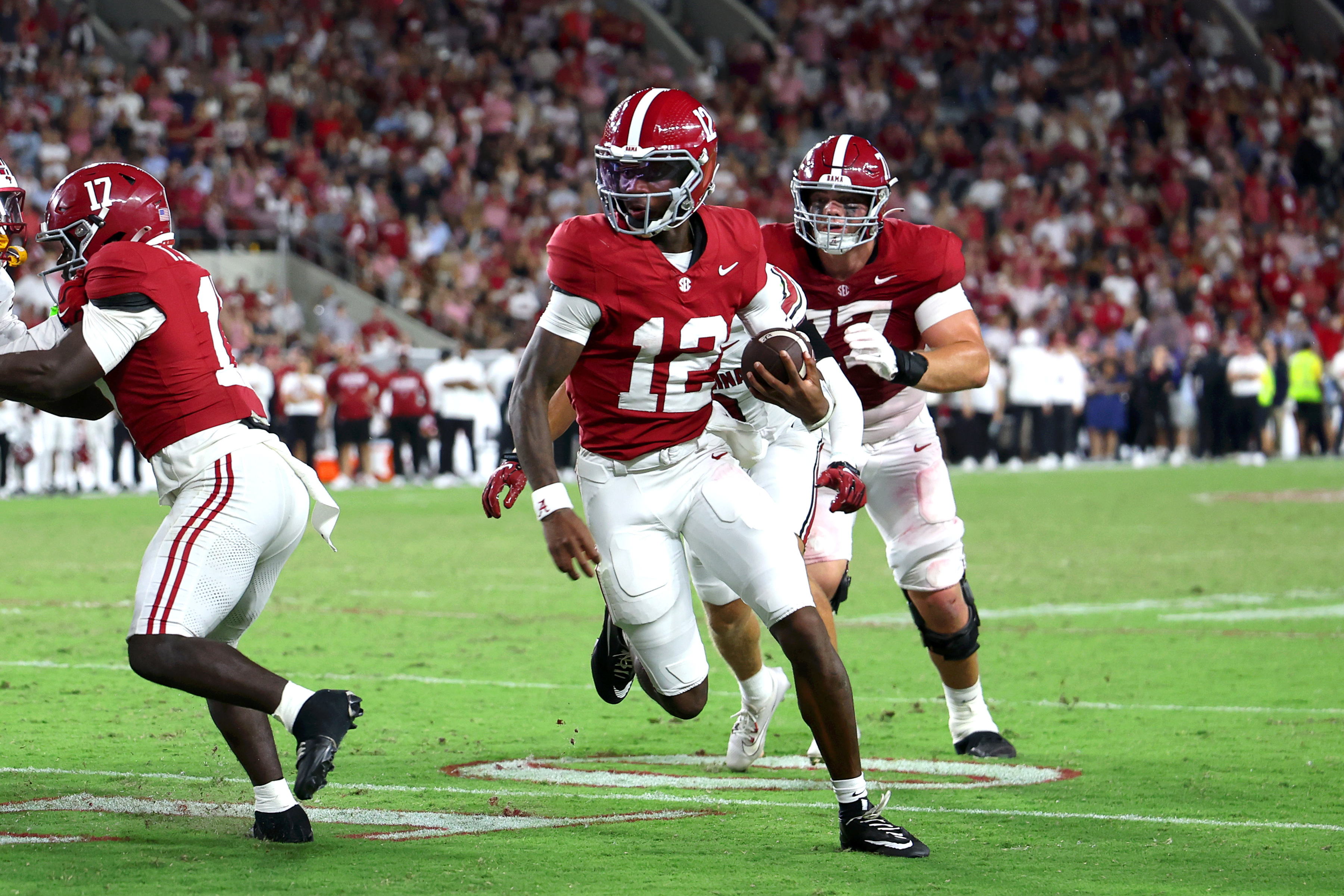 Sep 26, 2026; Tuscaloosa, Alabama, USA; Alabama Crimson Tide quarterback Keelon Russell (12) runs the ball during the second half against the South Carolina Gamecocks at Saban Field at Bryant-Denny Stadium. Mandatory Credit: David Leong-Imagn Images