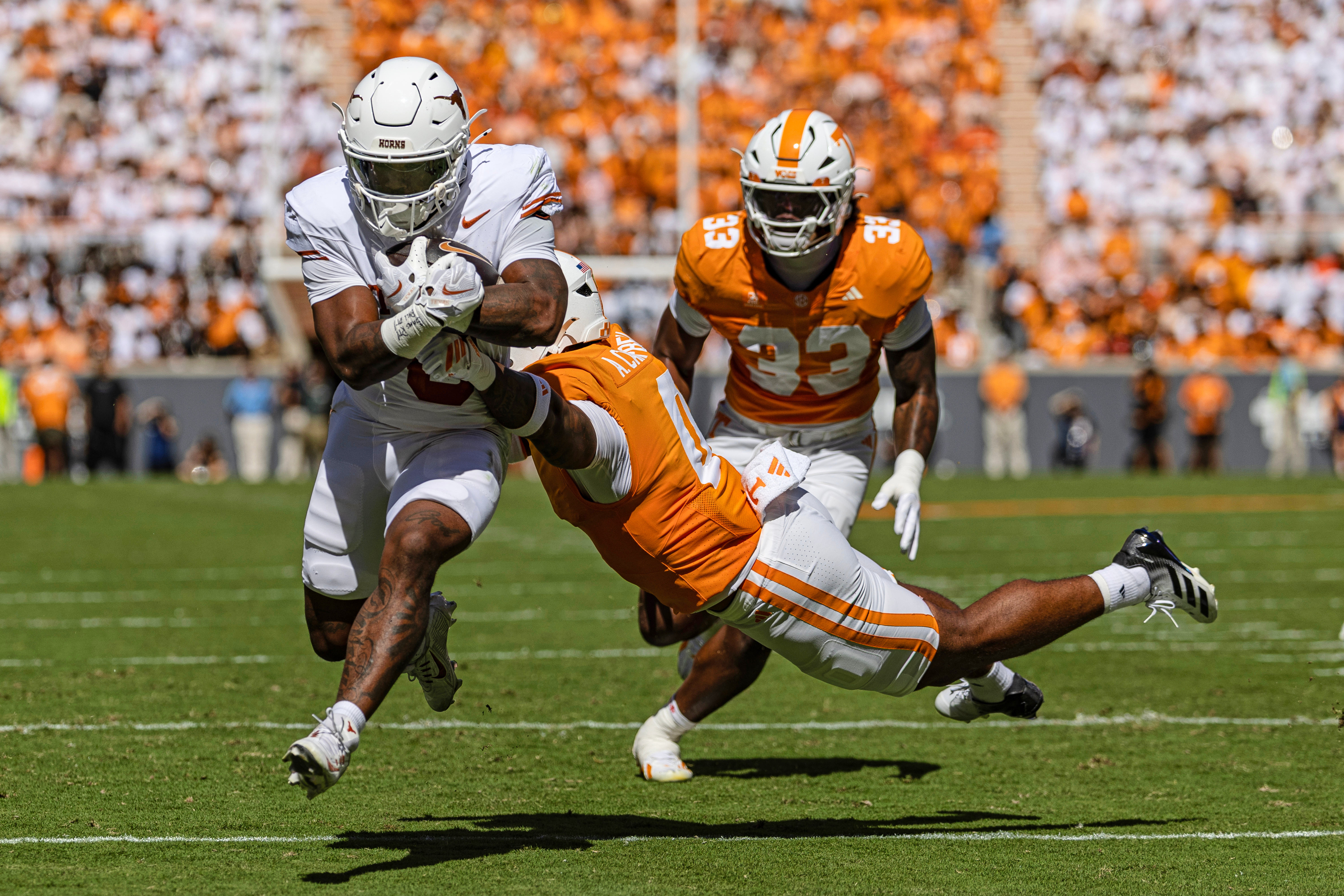 No. 1 Texas survives penalties, special teams errors to stave off miraculous comeback bid from No. 14 Tennessee