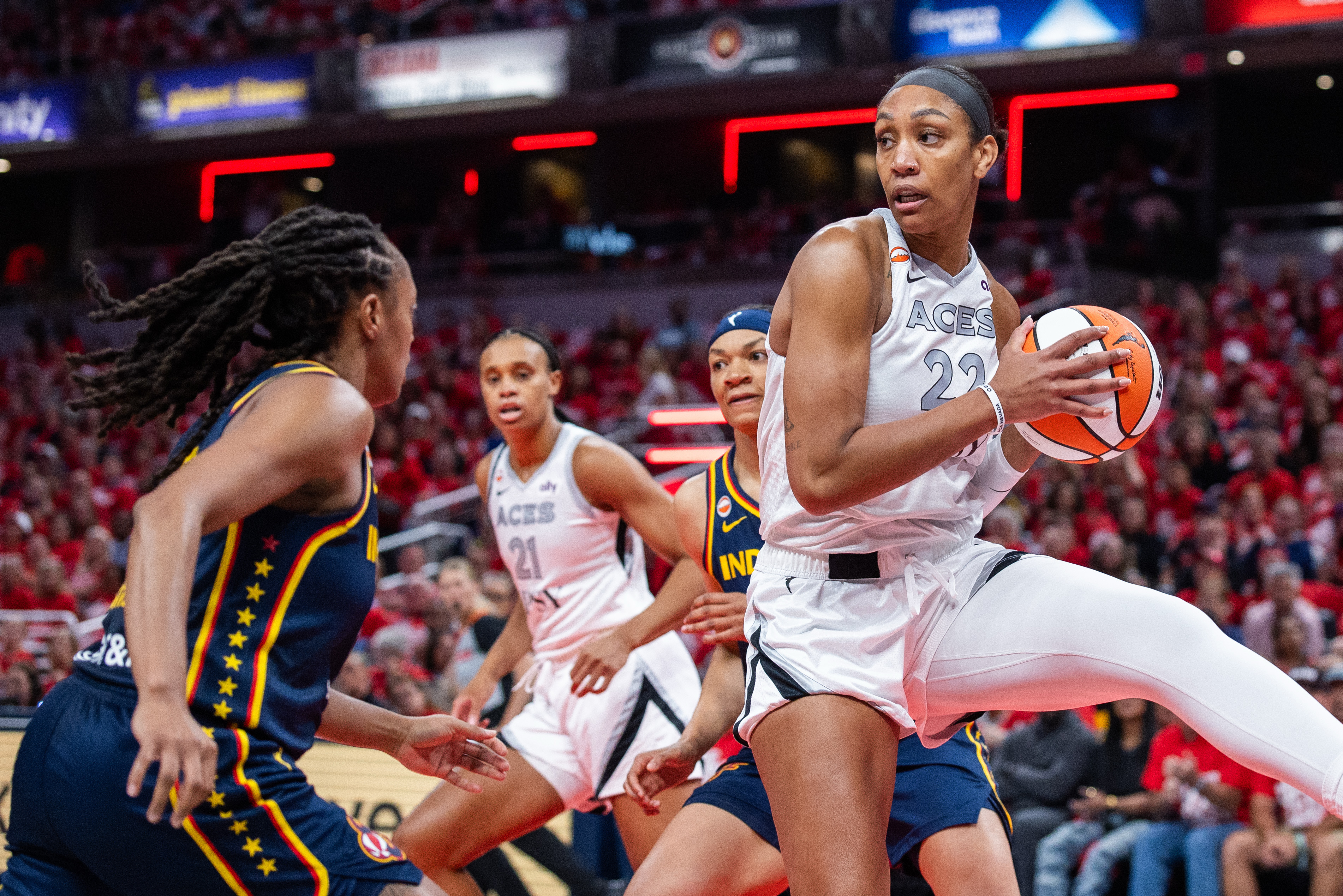 Aces star A'ja Wilson gets into heated exchange with fan in Game 2 vs. Fever after Sophie Cunningham foul