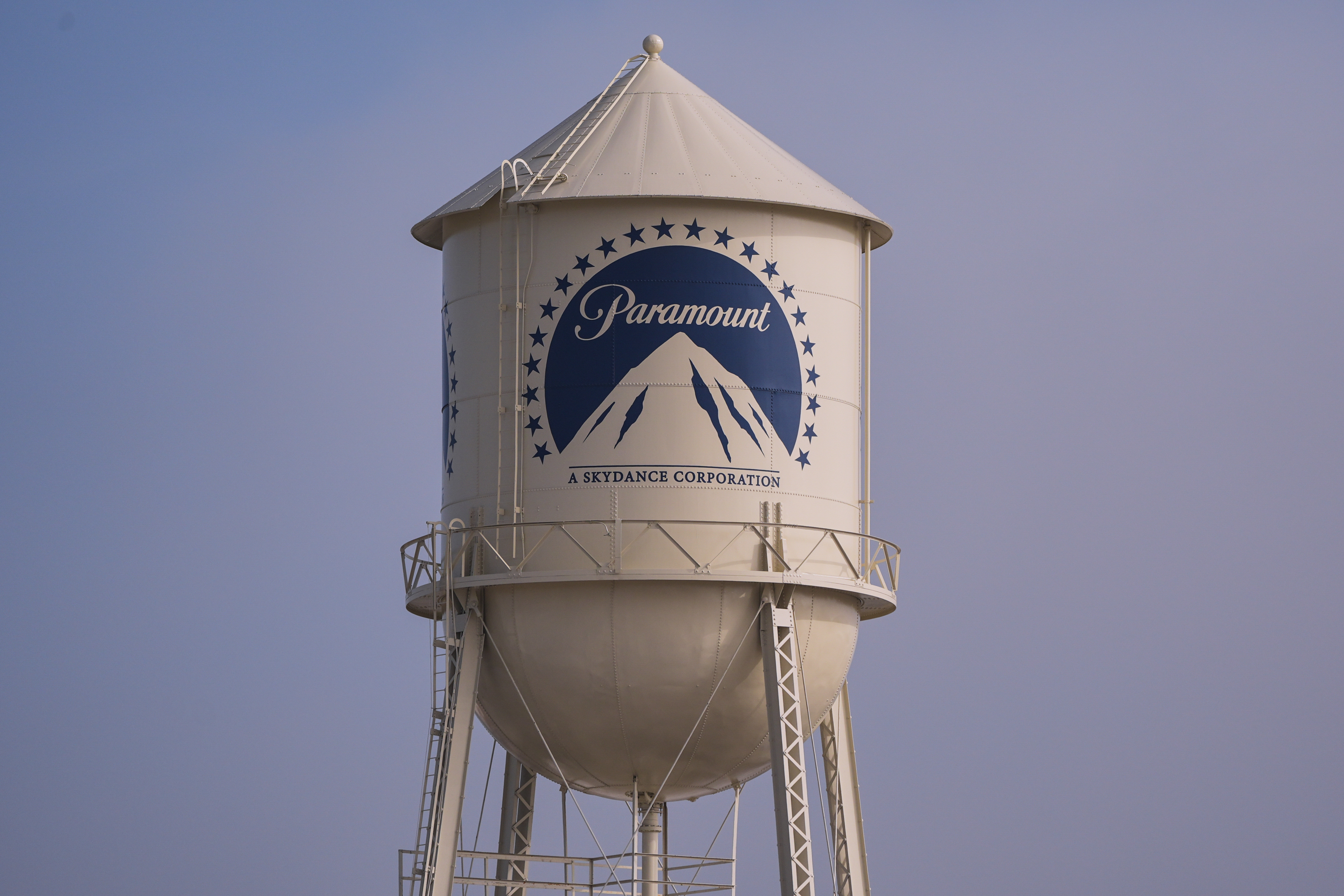 yahoo.com - Ines Ferré - Paramount, Warner Bros. shares rally on report of merger settlement agreement