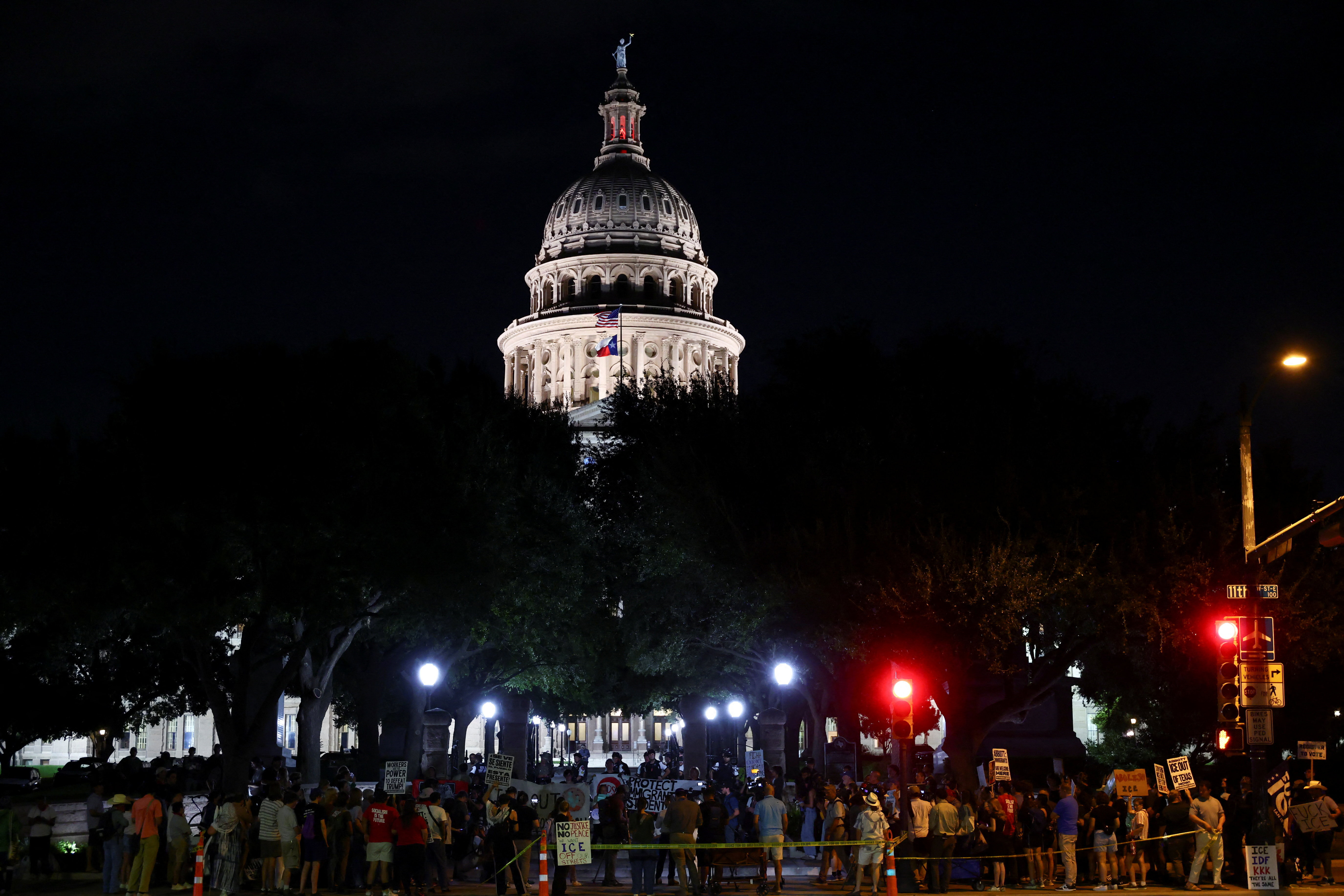 Texas city council candidate charged with riot participation after ICE shooting protest