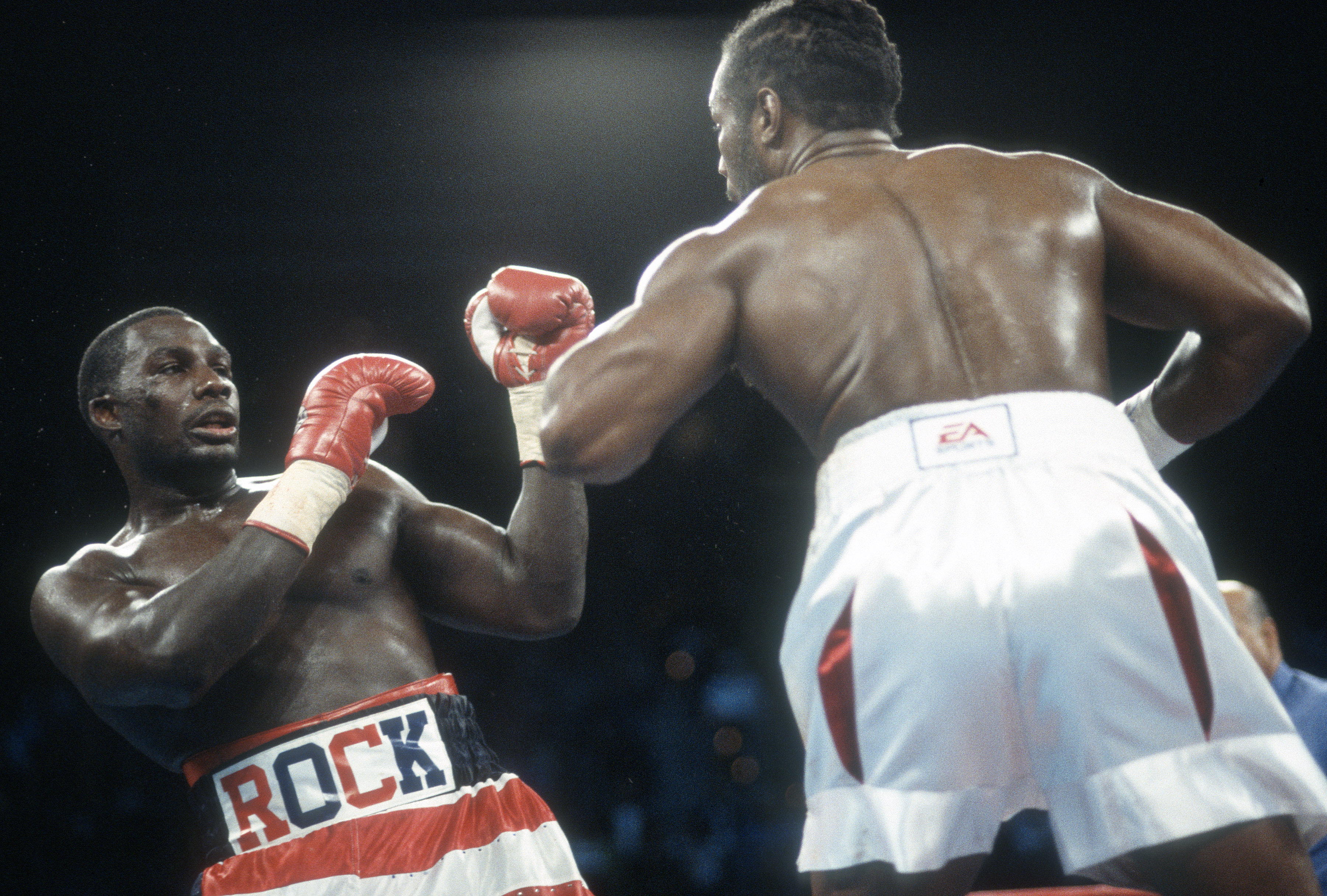 LAS VEGAS - NOVEMBER 17:  Lennox Lewis and Hasim Rahman for the WBC, IBO, IBF and Lineal heavyweight titles on November 17, 2001 at the Mandalay Bay Events Center in Las Vegas, Nevada. Lewis won the fight with a 5th round KO. (Photo by Focus on Sport/Getty Images)