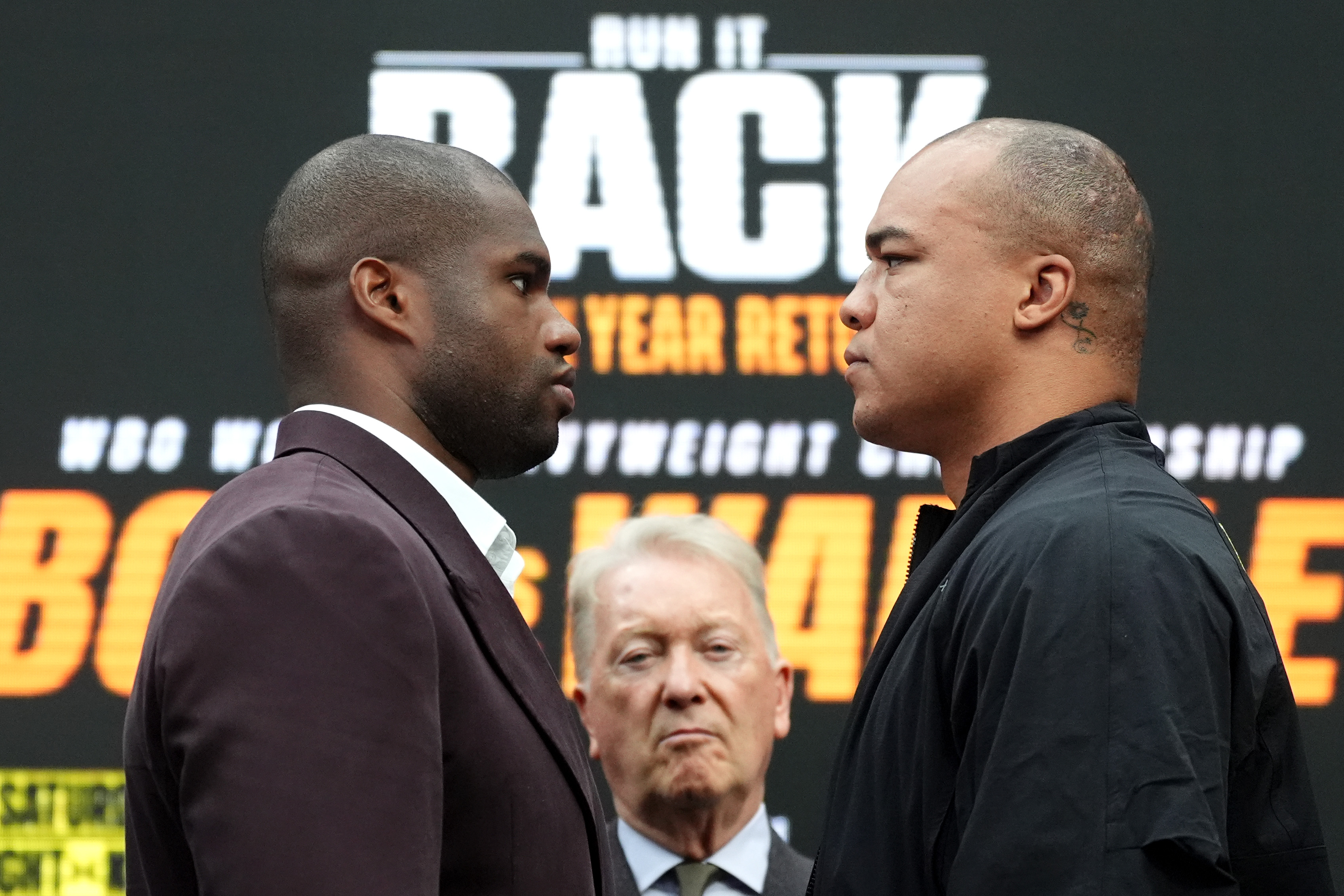 Boxers Daniel Dubois (left) and Fabio Wardley face off with boxing promotor Frank Warren looks on during a press conference at Studio 338, London. Picture date: Thursday October 15, 2026. (Photo by Adam Davy/PA Images via Getty Images)