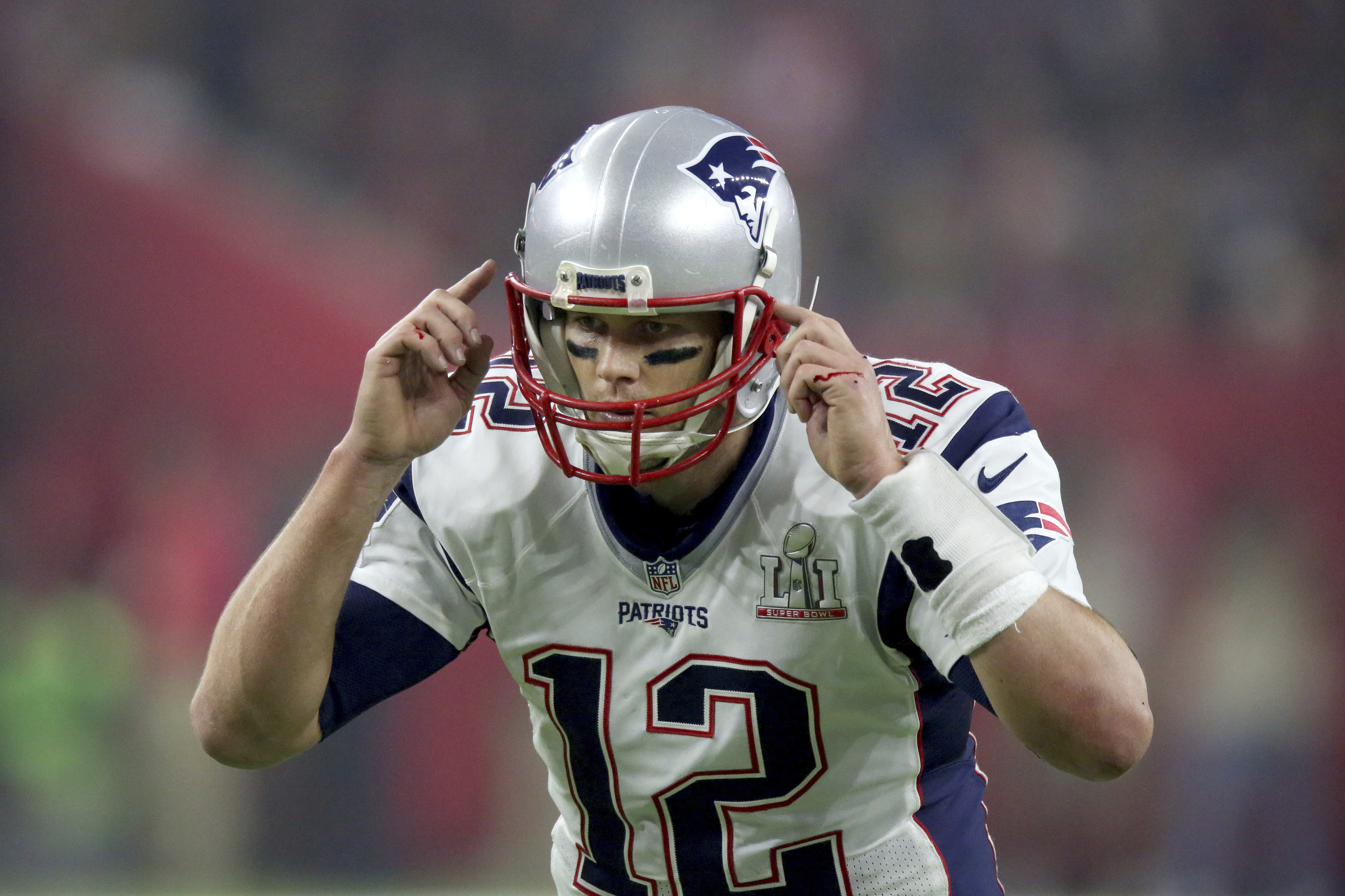 New England Patriots QB Tom Brady #12 calls signals at the line against the Atlanta Falcons at Super Bowl 51 on Sunday, February 5, 2017 in Houston, TX. (AP Photo/Gregory Payan)