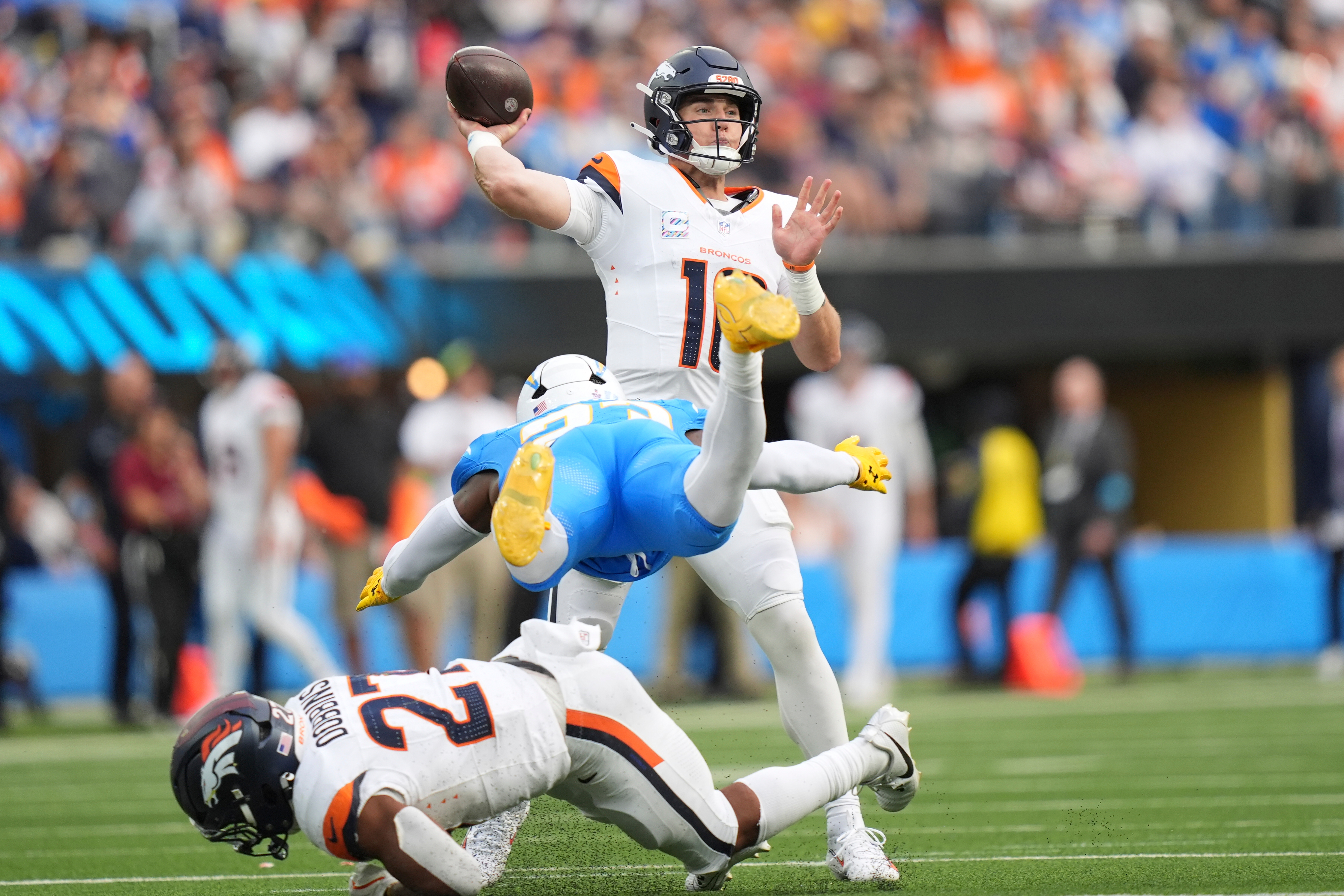 Broncos struggle on offense again but get an ugly victory over still winless Chargers