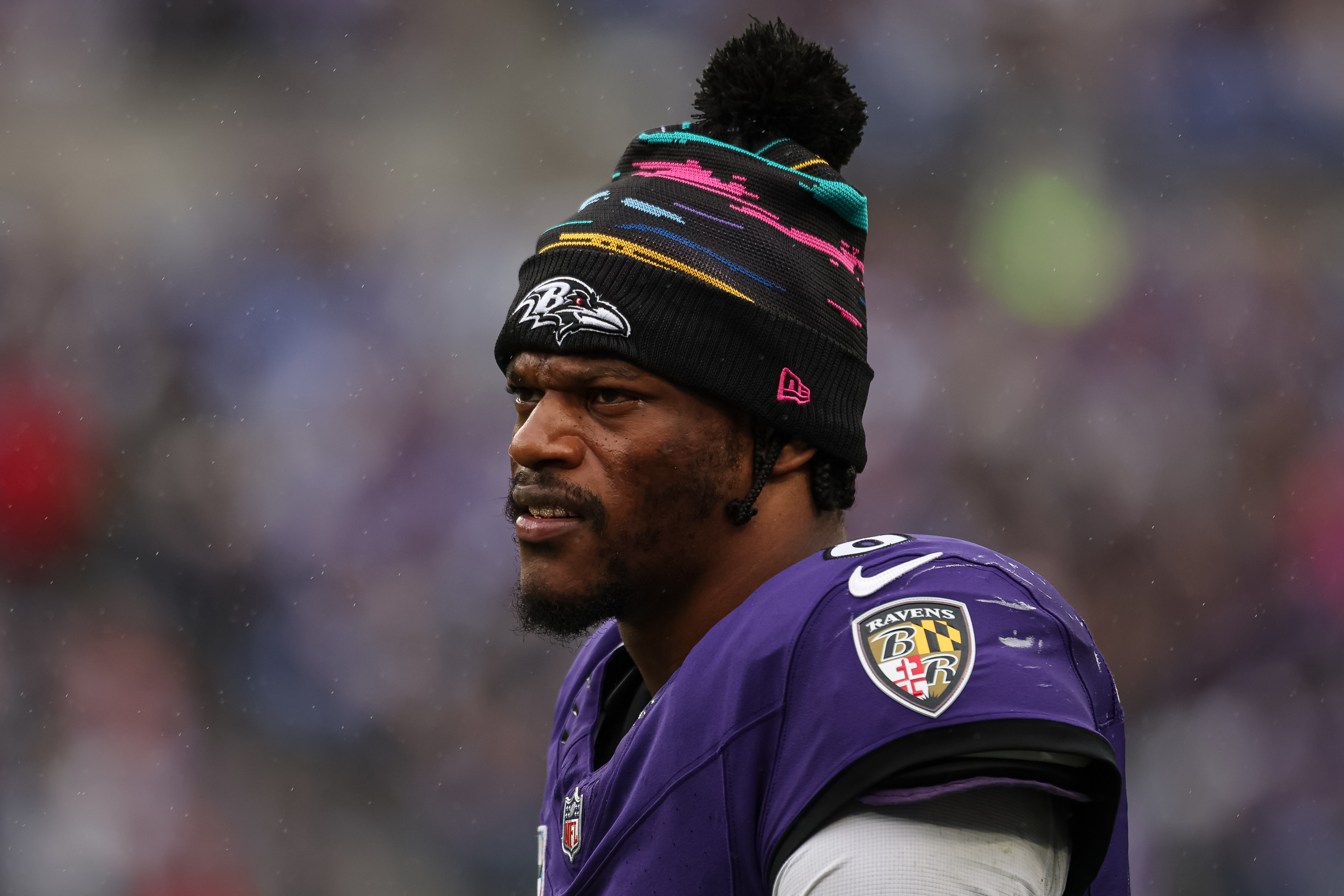 BALTIMORE, MARYLAND - Lamar Jackson of the Baltimore Ravens looks on from the sideline during the second half against the Tennessee Titans at M&T Bank Stadium. (Photo by Scott Taetsch/Getty Images)