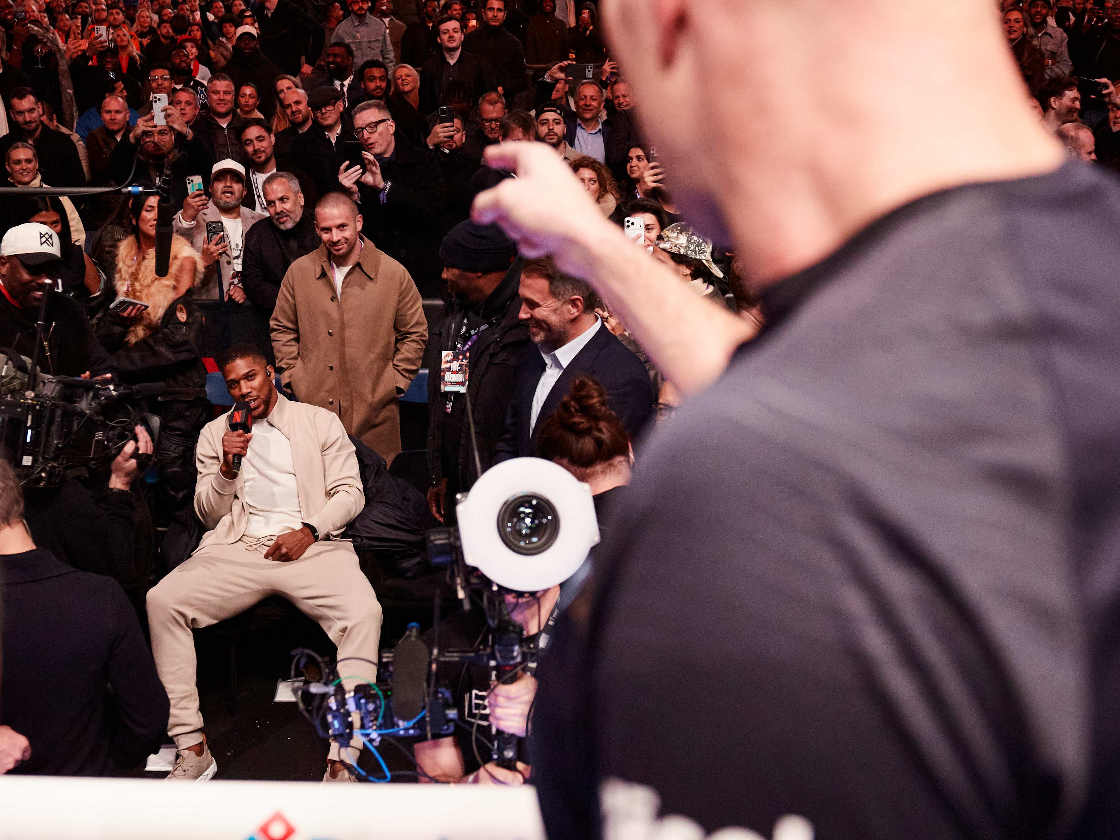 LONDON, ENGLAND - APRIL 11: Tyson Fury exchanges words with Anthony Joshua after his fight at Tottenham Hotspur Stadium on April 11, 2026 in London, England. (Photo by Mark Robinson/Getty Images)