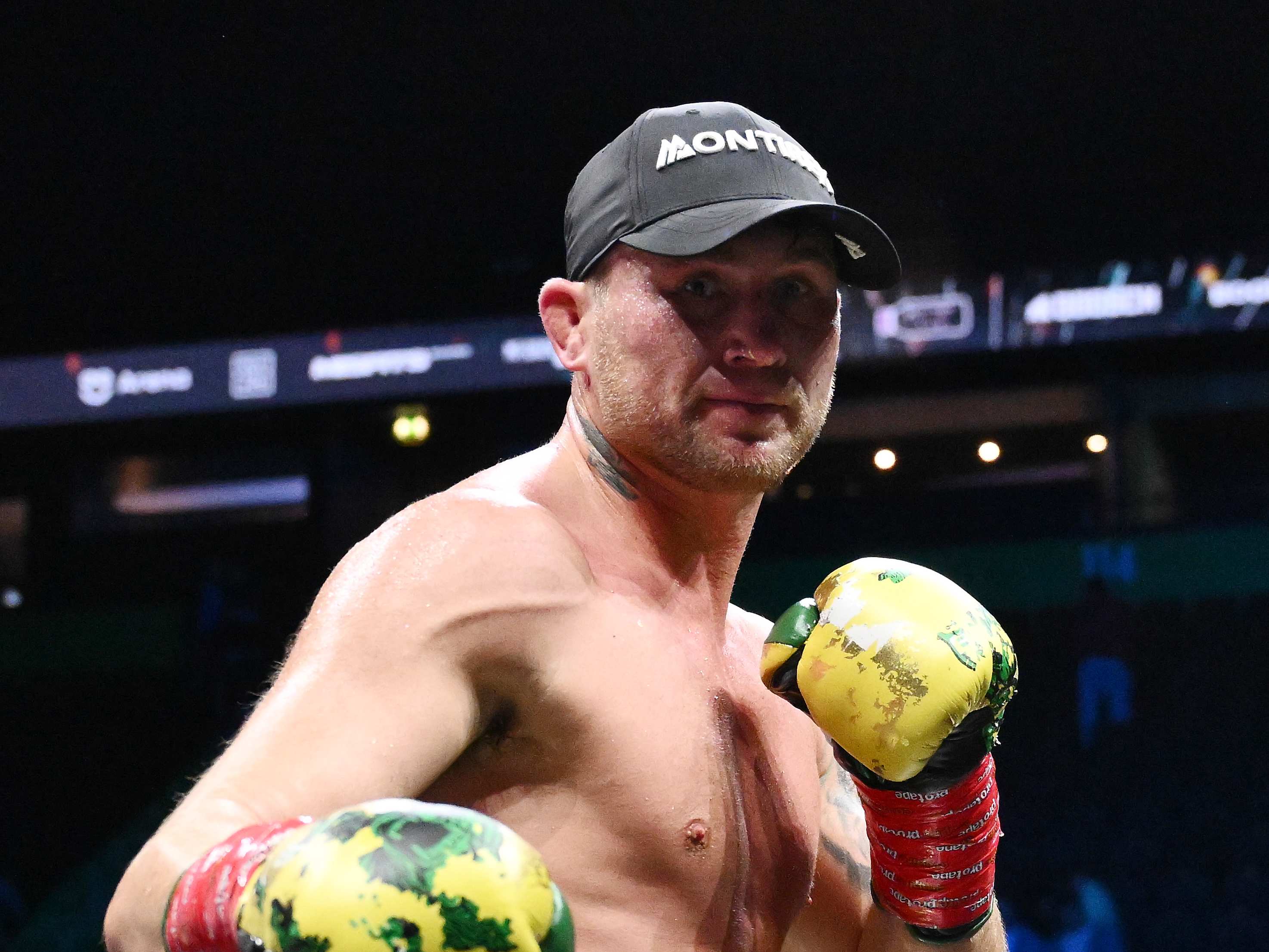 MANCHESTER, ENGLAND - AUGUST 30: Darren Till celebrates with his belt after victory in the Light Heavyweight fight between Darren Till and Luke Rockhold during the Misfits 22 - Ring of Thrones fight night at AO Arena on August 30, 2025 in Manchester, England.  (Photo by Ben Roberts Photo/Getty Images)