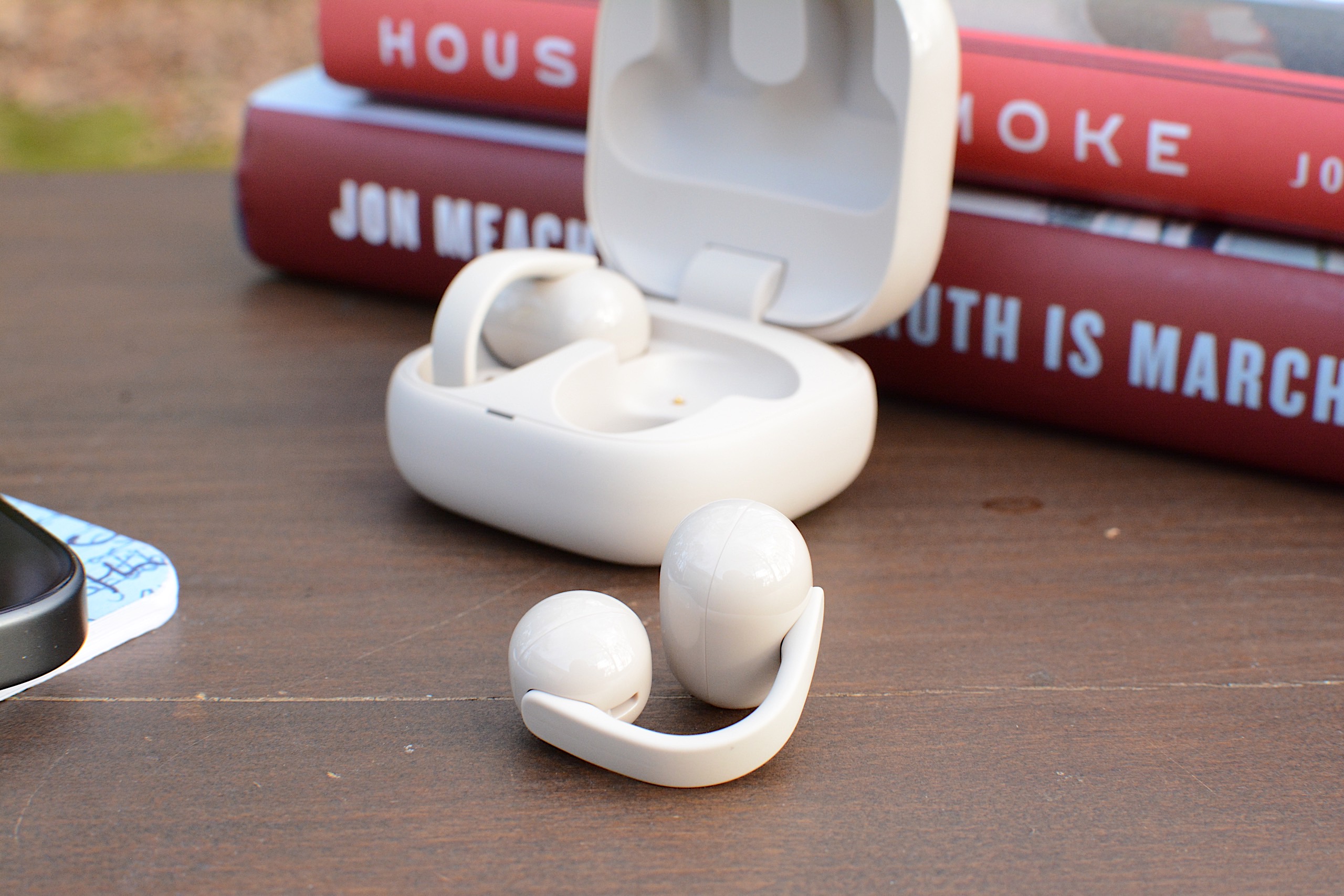 Controls are situated along the connector between the two cylindrical housings