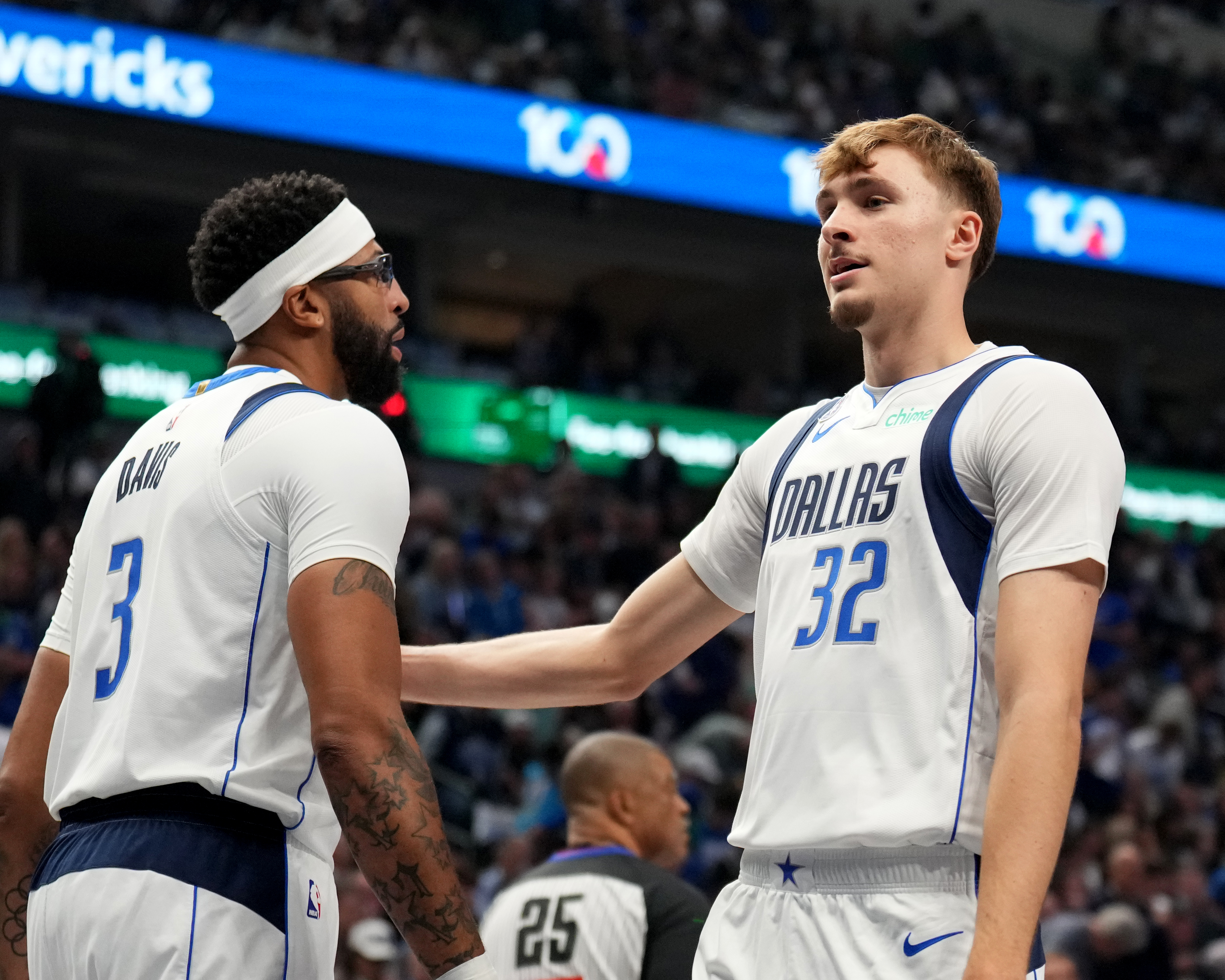DALLAS, TX - OCTOBER 22: Anthony Davis #3 and Cooper Flagg #32 of the Dallas Mavericks talk during the game against the San Antonio Spurs on October 22, 2025 at American Airlines Center in Dallas, Texas. NOTE TO USER: User expressly acknowledges and agrees that, by downloading and or using this photograph, User is consenting to the terms and conditions of the Getty Images License Agreement. Mandatory Copyright Notice: Copyright 2025 NBAE (Photo by Jesse D. Garrabrant/NBAE via Getty Images)