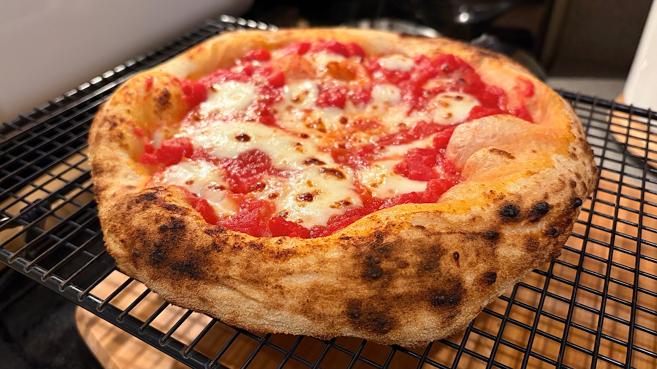 Neapolitan-style pizza baked with the Volt 2 preset has ample leoparding. 