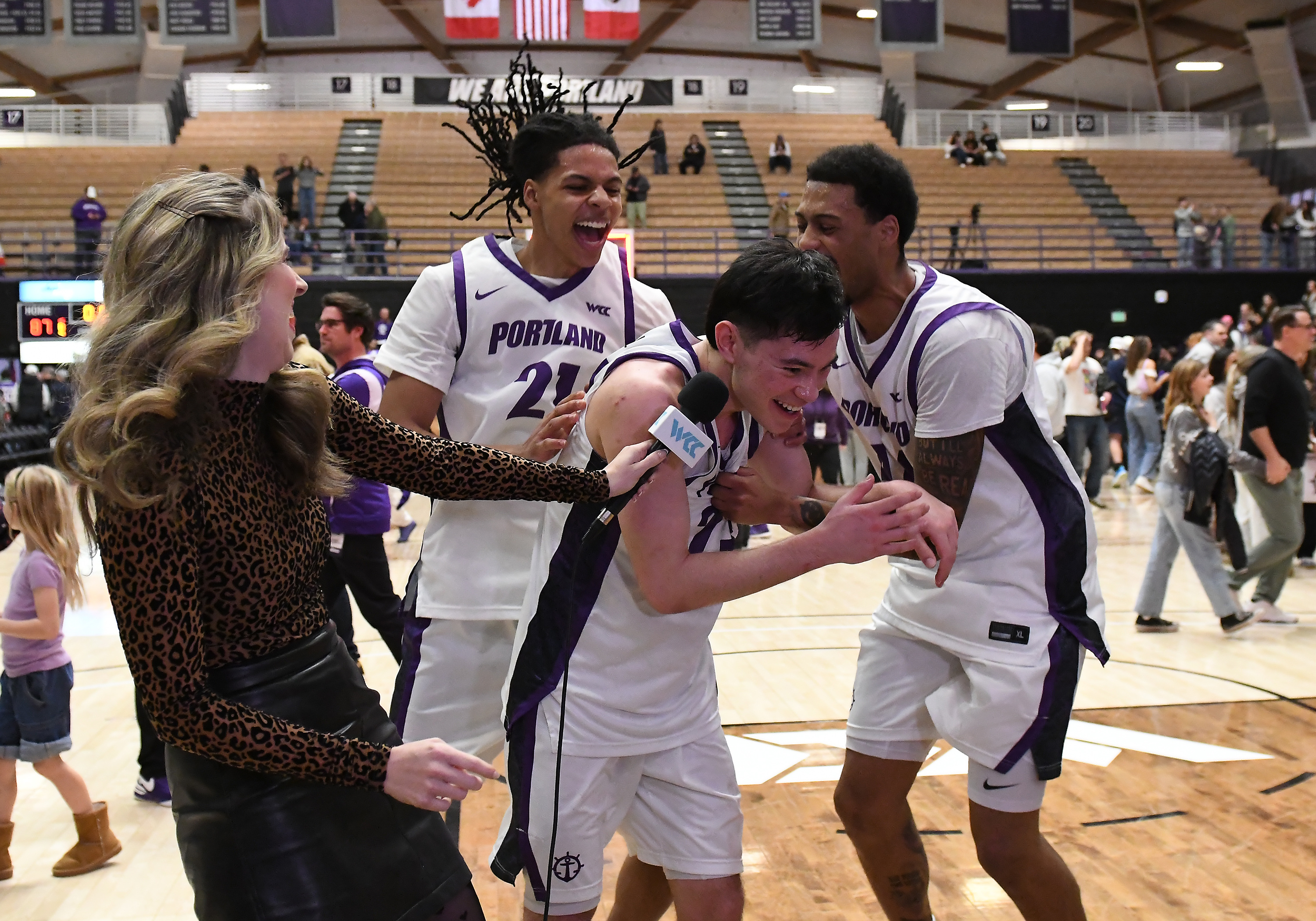 Freshman Joel Foxwell, who scored a game-high 27 points, is swarmed by teammates after the win. (Brian Murphy/Icon Sportswire via Getty Images)
