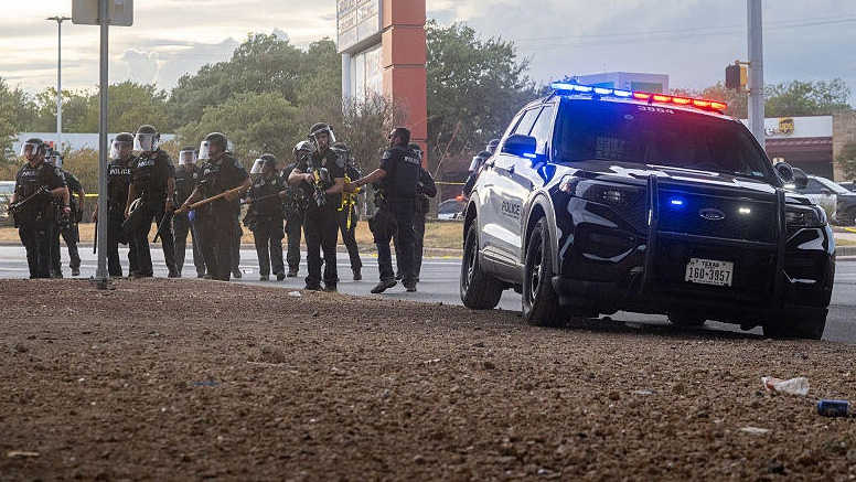 ICE enforcement vehicle in an Austin Texas street setting