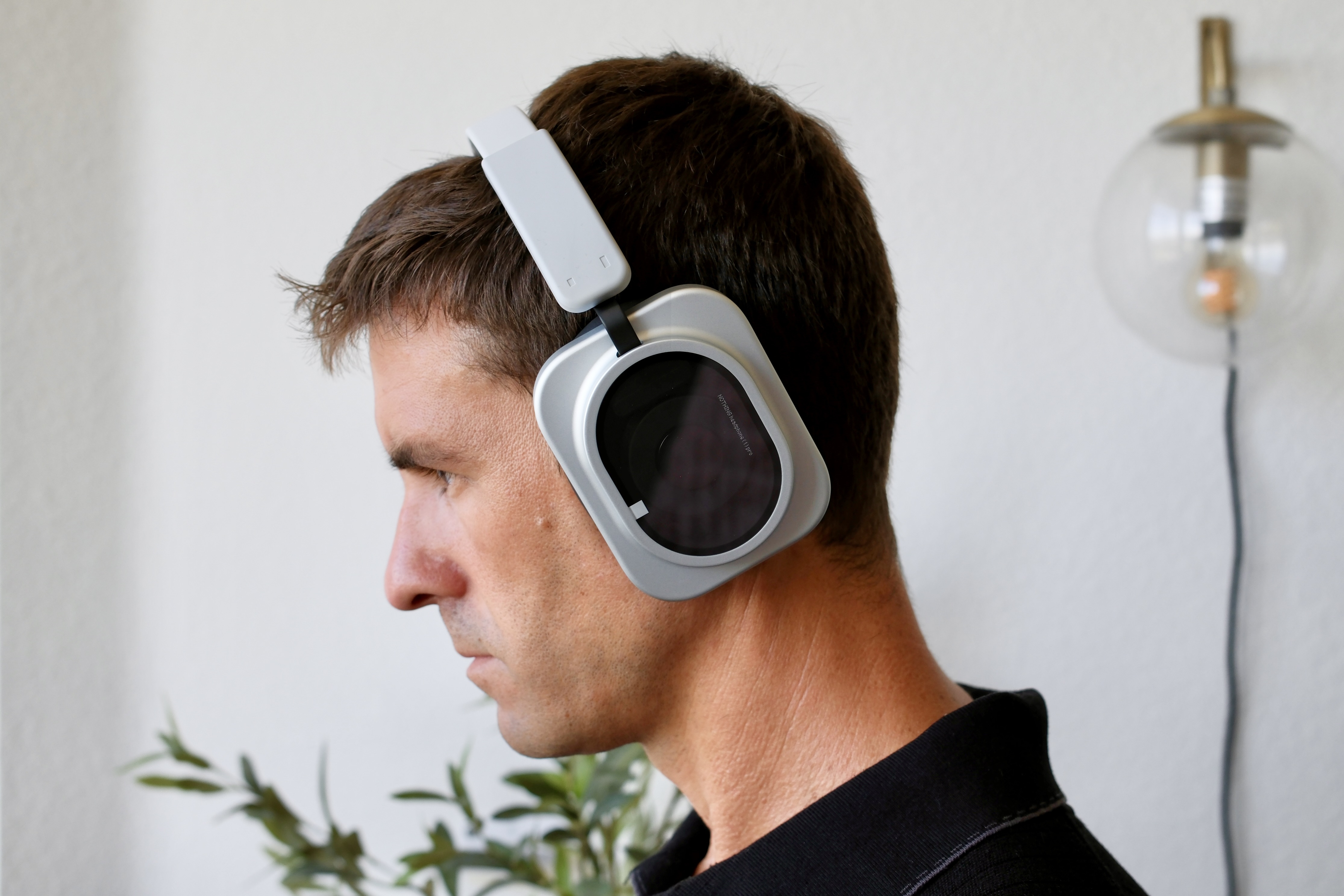 person wearing the nothing Headphone 1 Pro