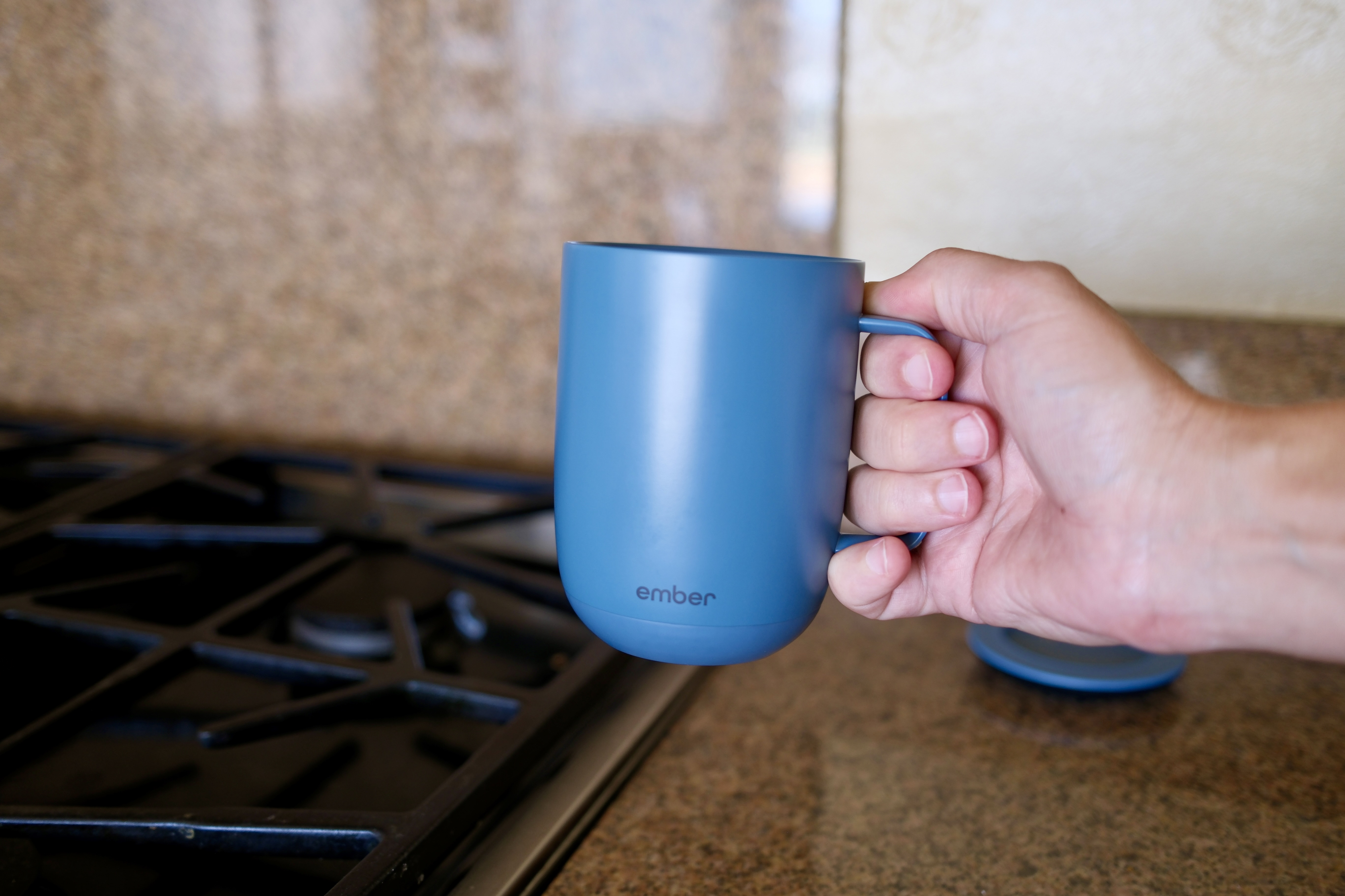 Hand holding Ember Mug 3