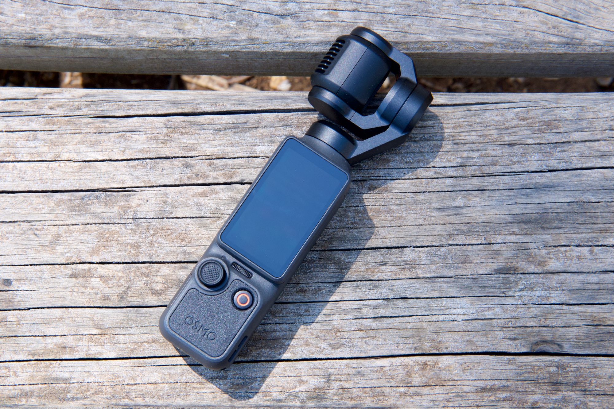 The Osmo Pocket 4 flipped down and powered off