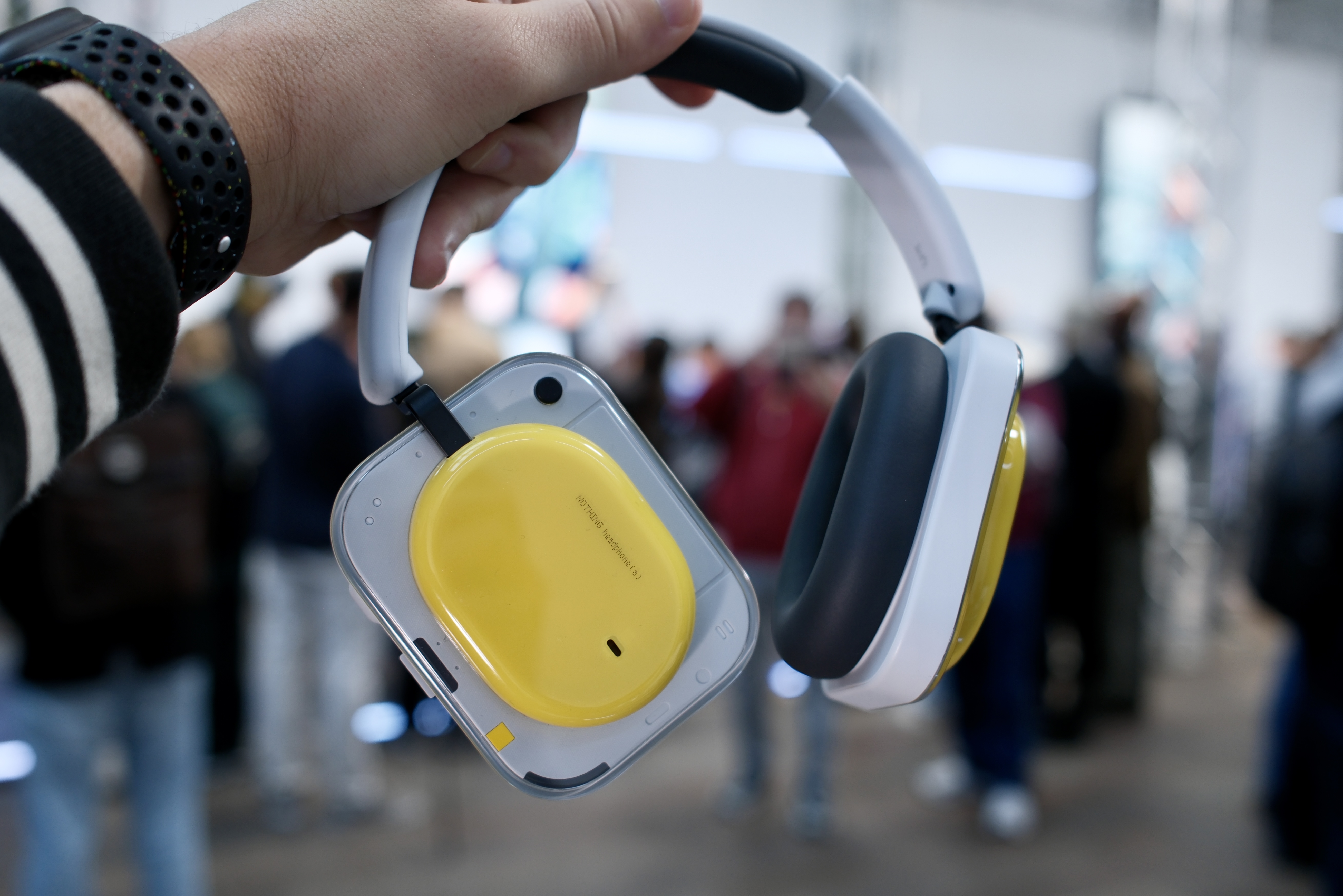 Nothing Headphone (a) being held in hand