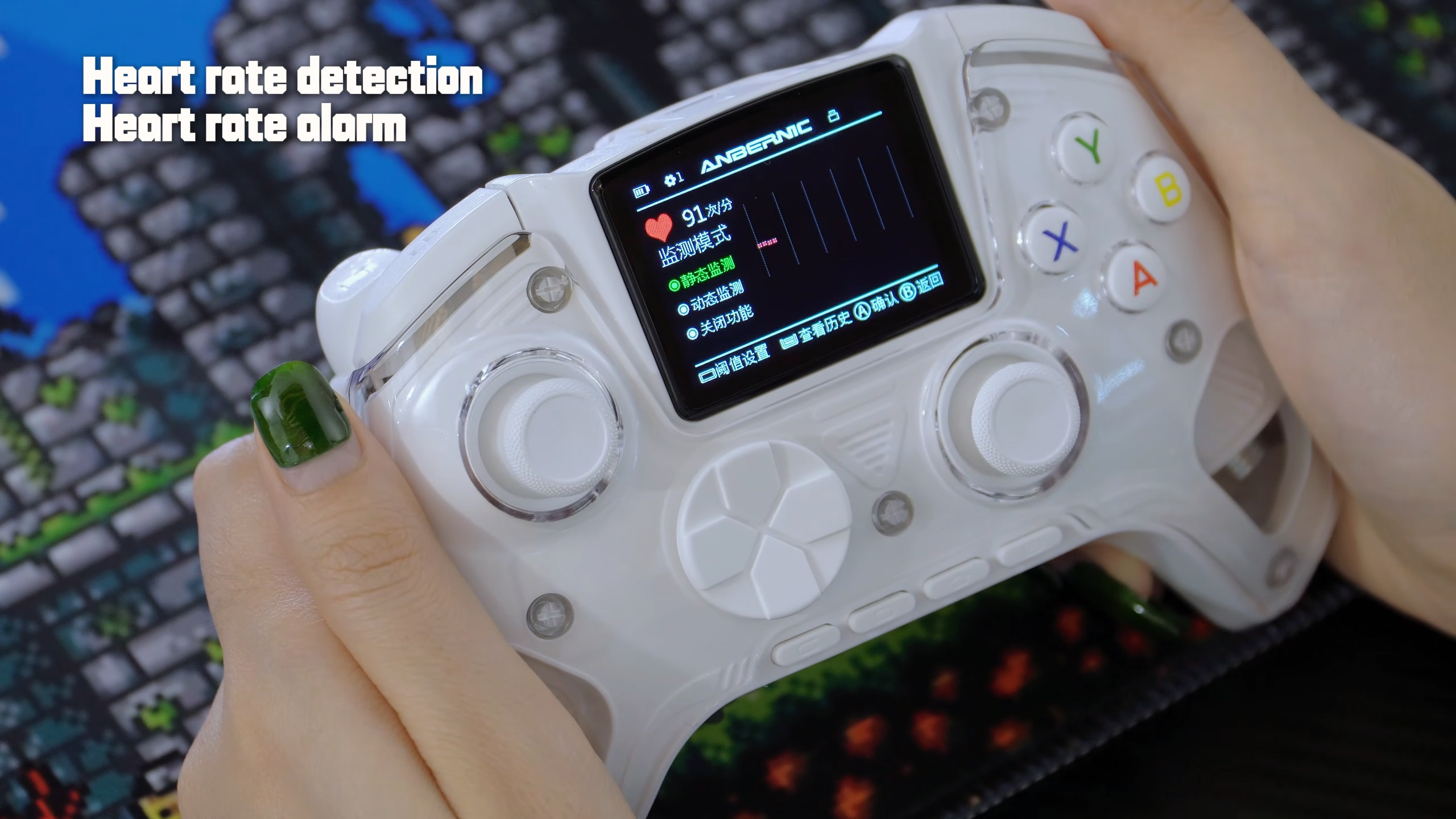 A person's hands holding a gamepad that has a screen on it. It shows their heart rate.