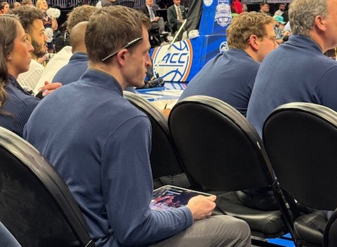 Virginia director of analytics Matt Hart plays a key role during games by making decision on whether to challenge calls. (Dan Wolken/Yahoo Sports)