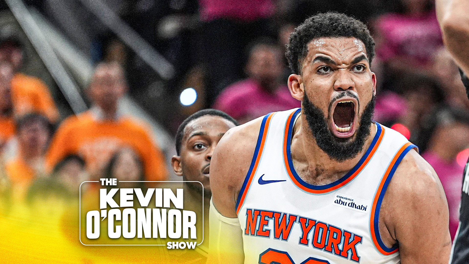 New York Knicks center Karl-Anthony Towns (32) yells during the second half of Game 1 of the NBA Finals basketball series against the San Antonio Spurs, Wednesday, June 3, 2026, in San Antonio. (AP Photo/Eric Gay)